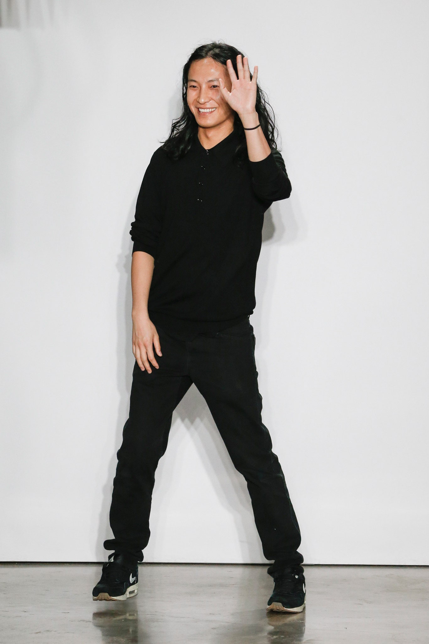 black relaxed top with fitted pants