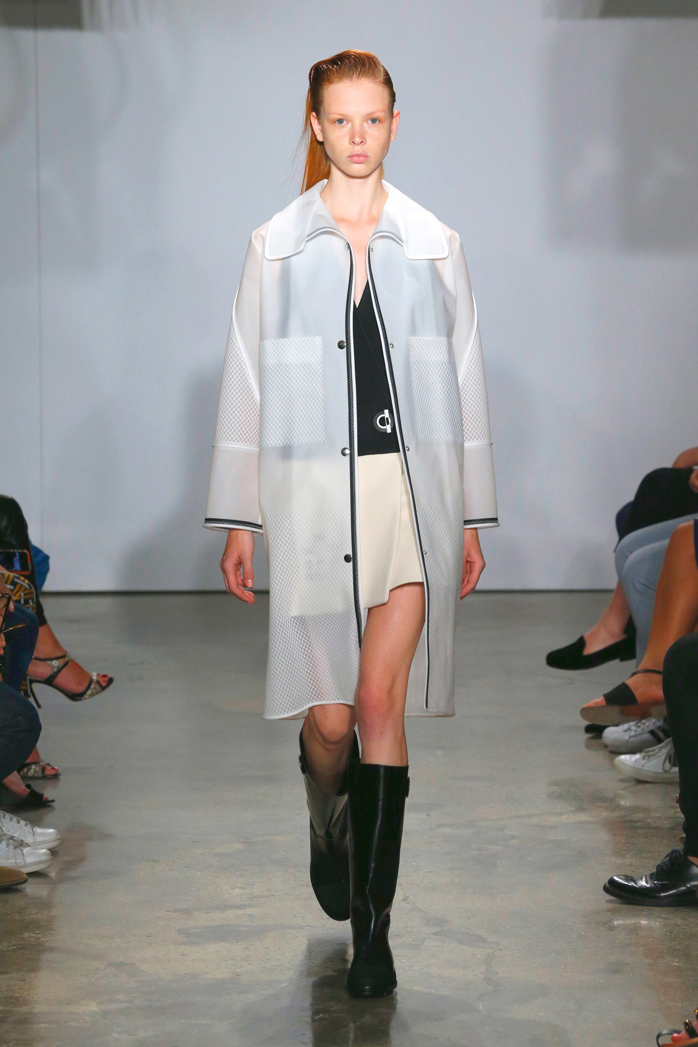white vinyl coat with black top