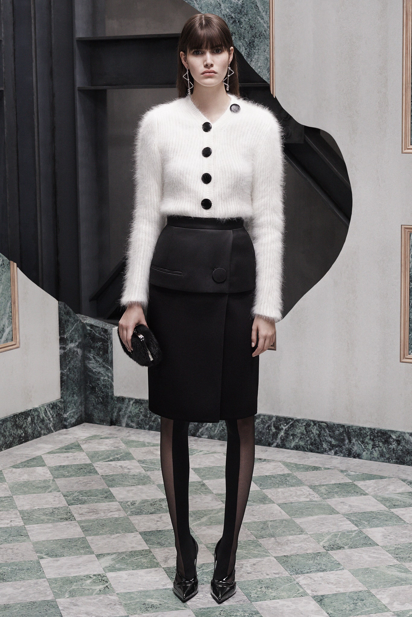 white fitted blouse and black skirt