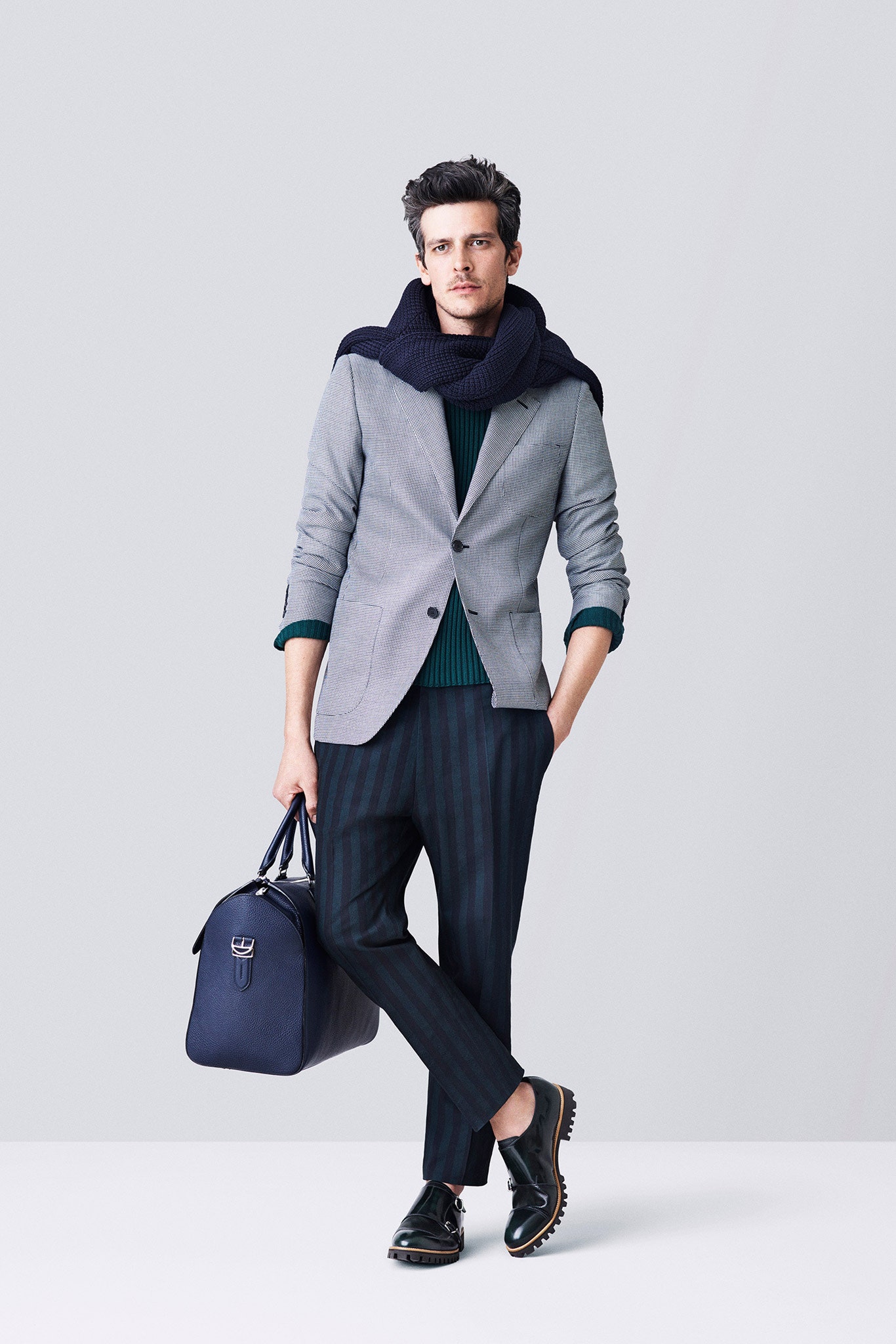 gray tailored blazer with green sweater
