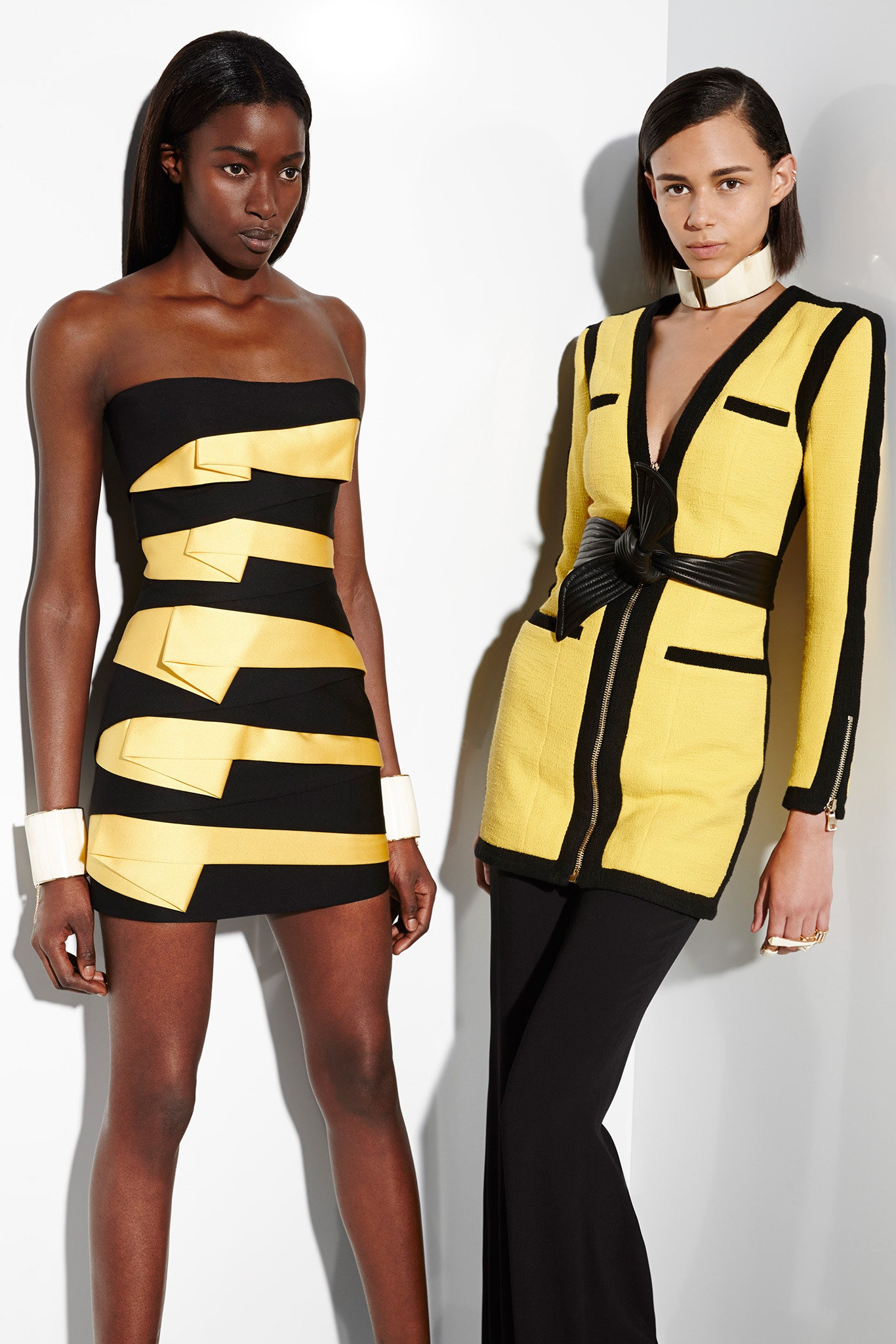 black and yellow fitted mini-dress and tailored blazer