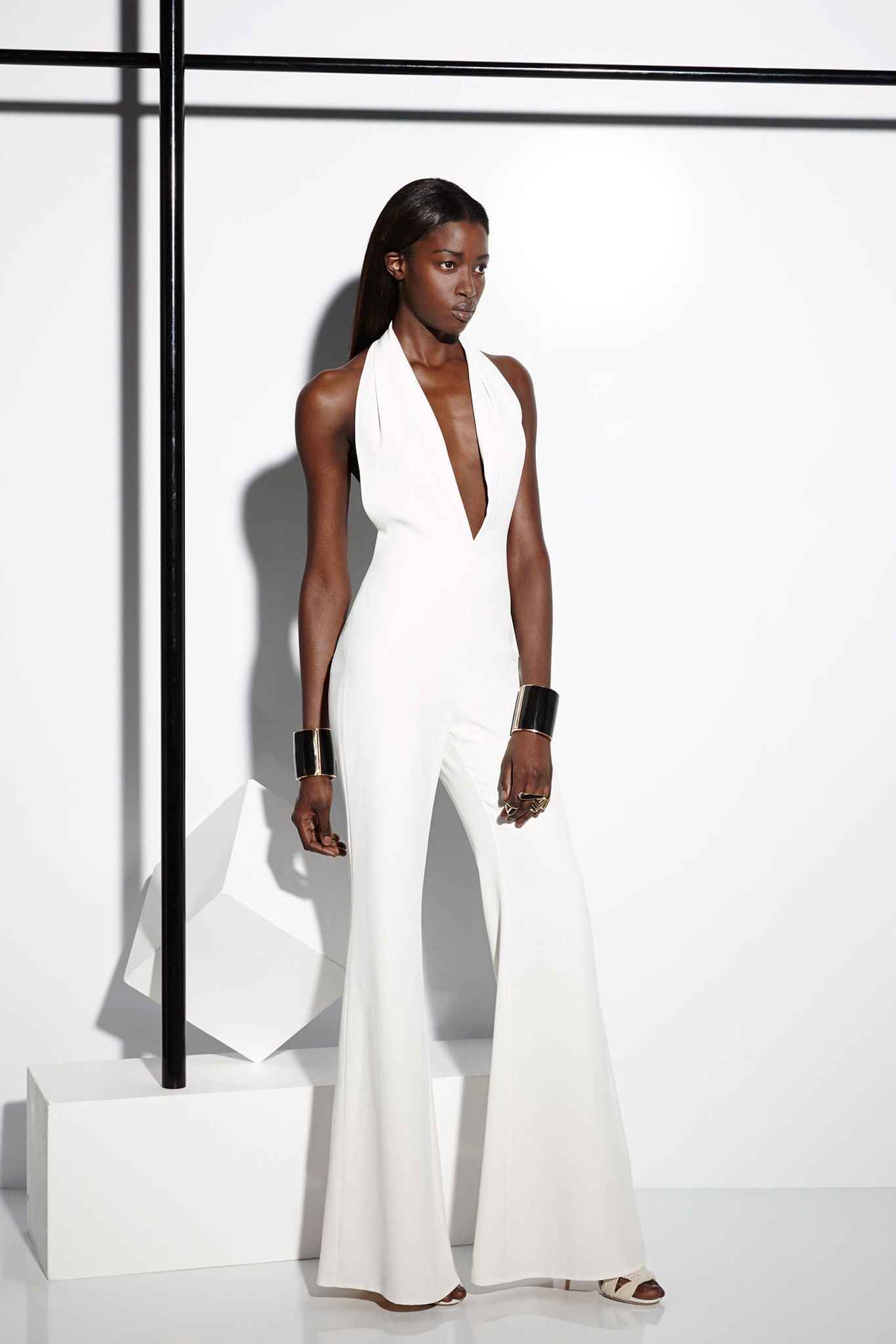 white fitted sleeveless jumpsuit