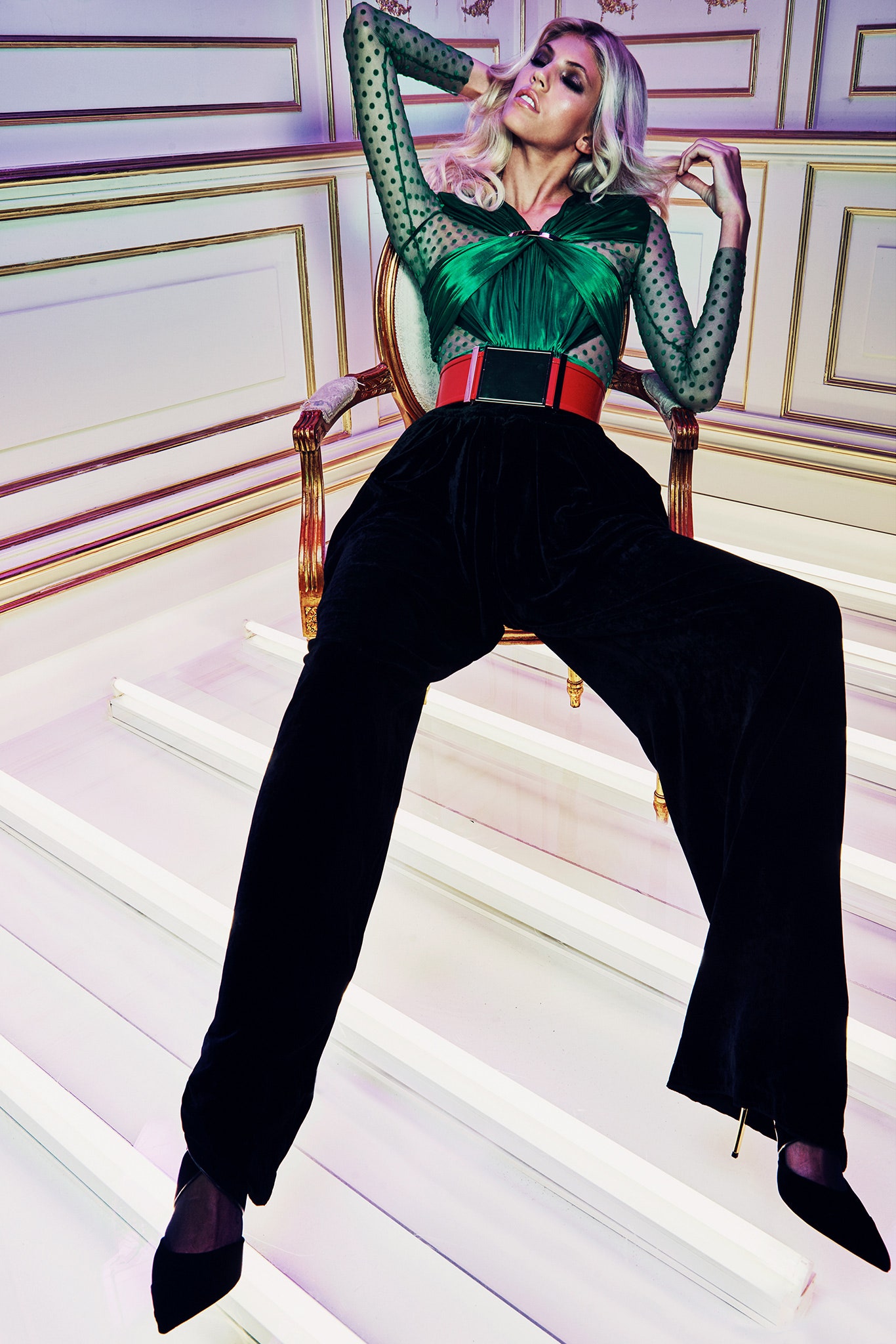 green pleated top with black velvet pants