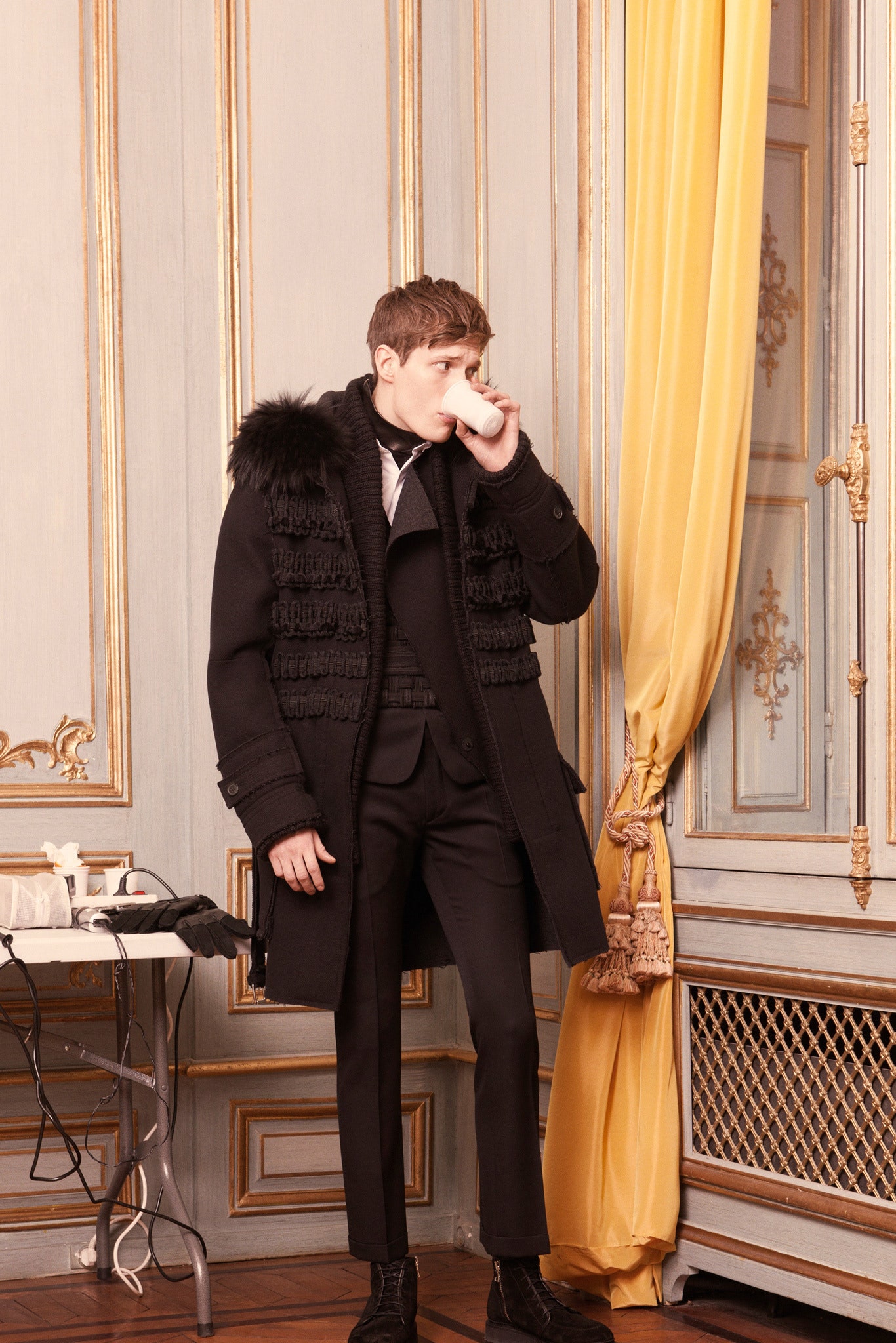 black wool fitted coat and suit