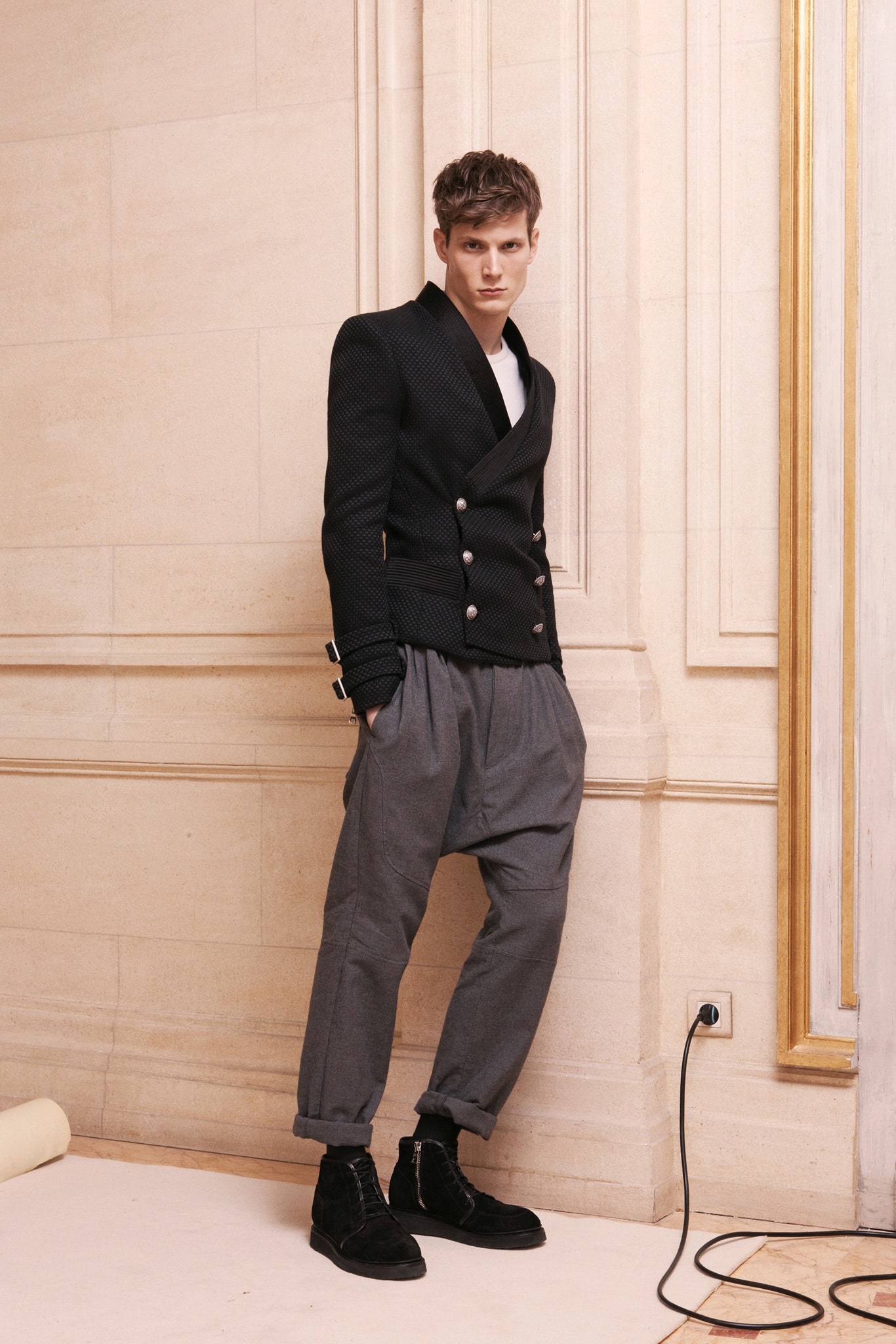 black tailored blazer gray relaxed pants