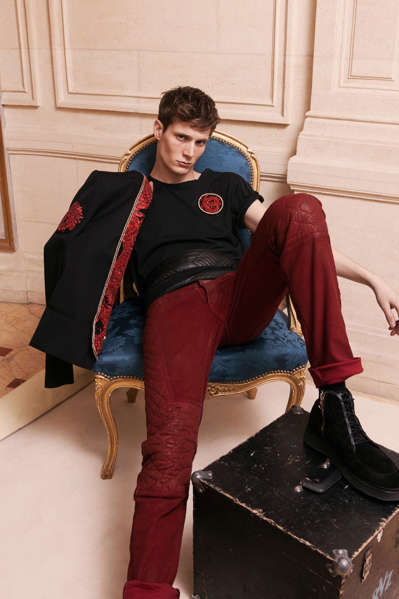 black t-shirt red leather pants