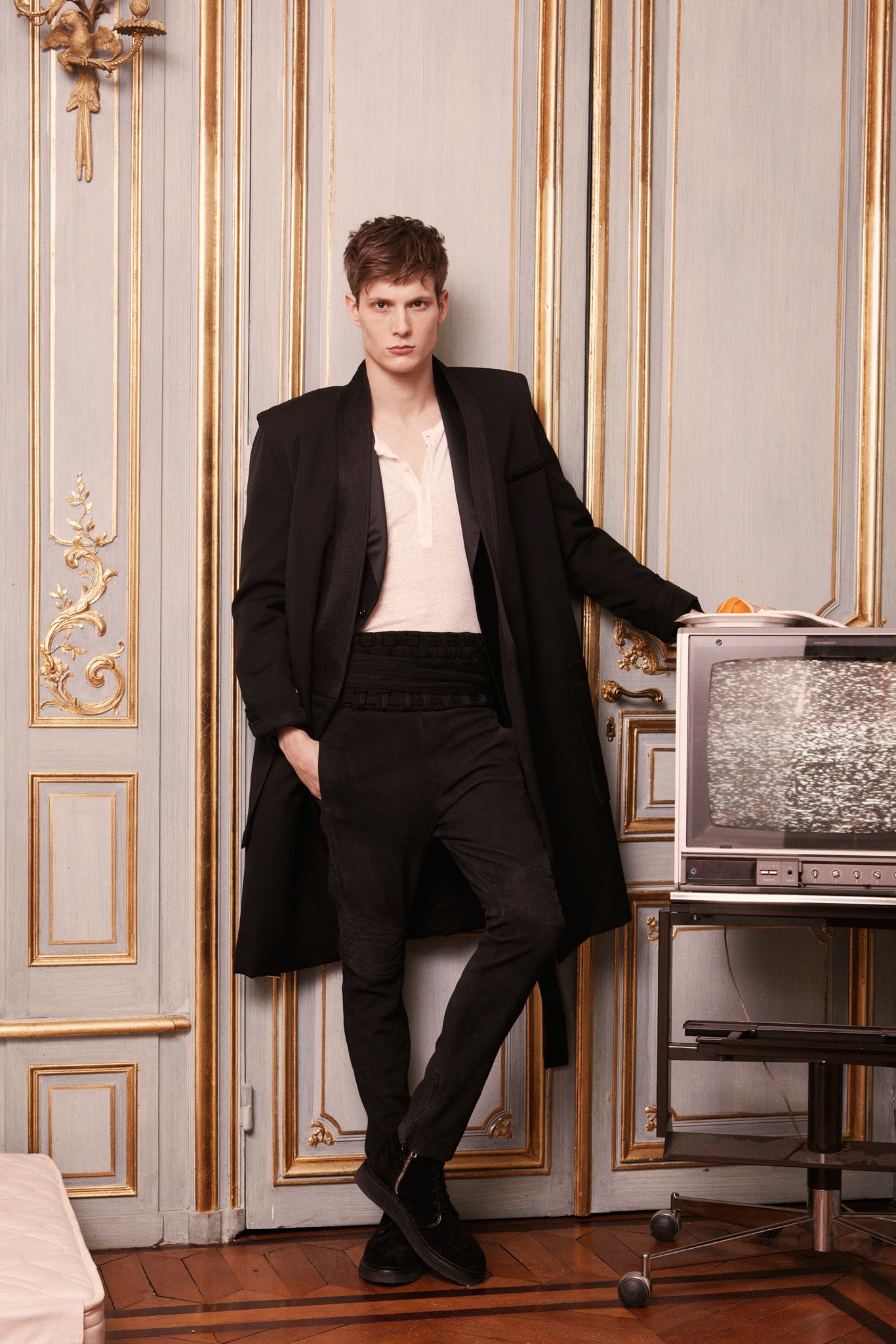 black coat white top black pants