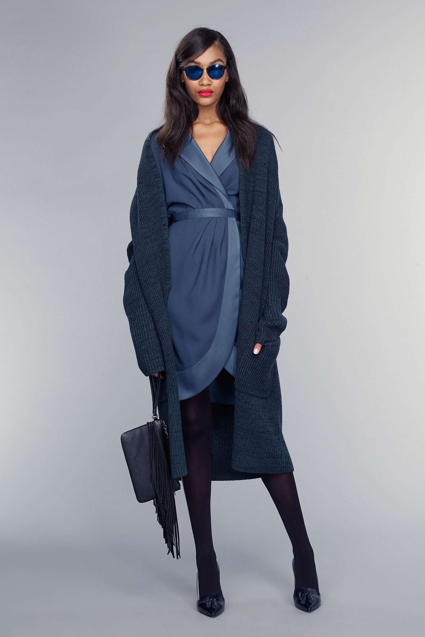 blue silk mini dress with oversized black cardigan