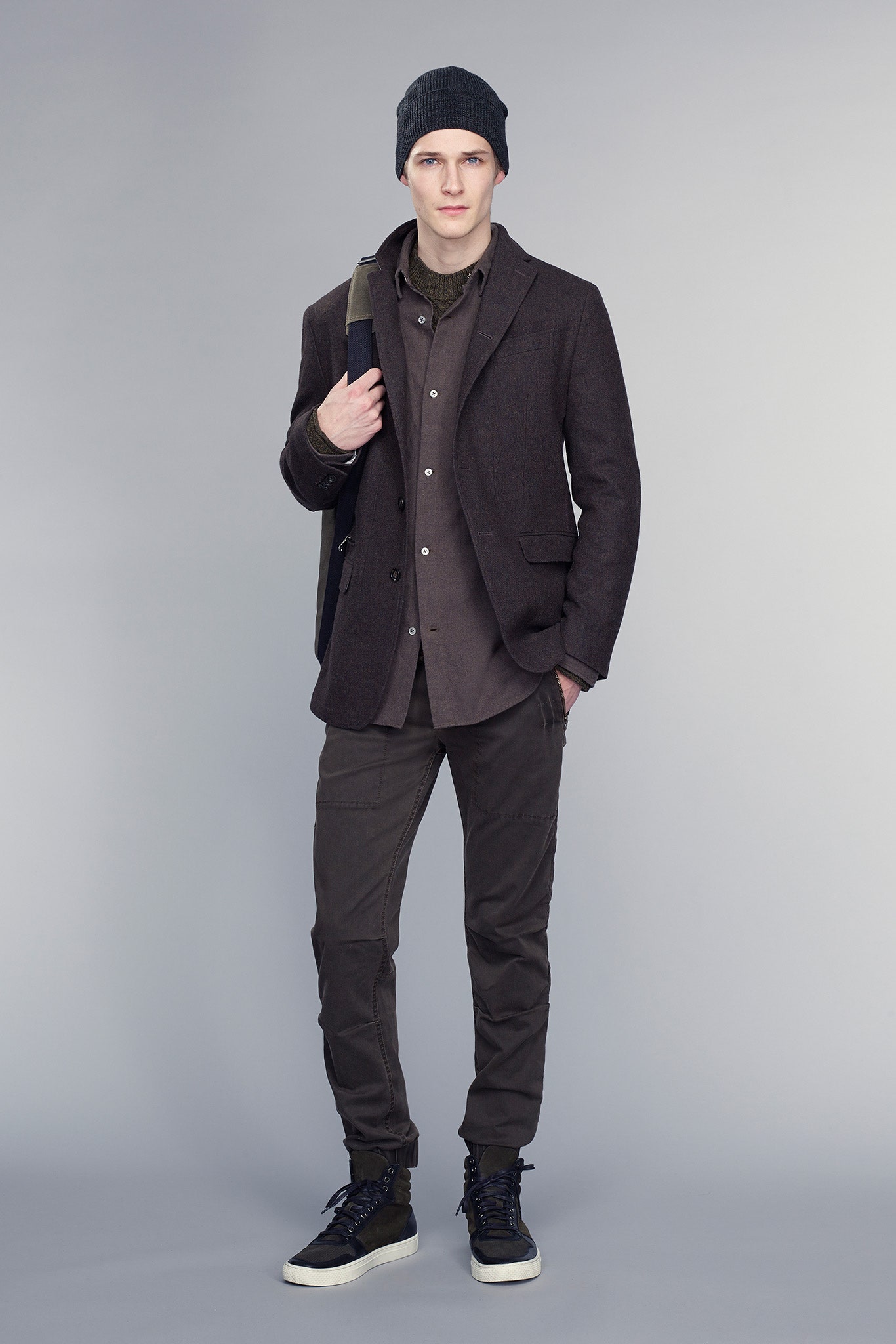 brown tailored jacket with gray shirt