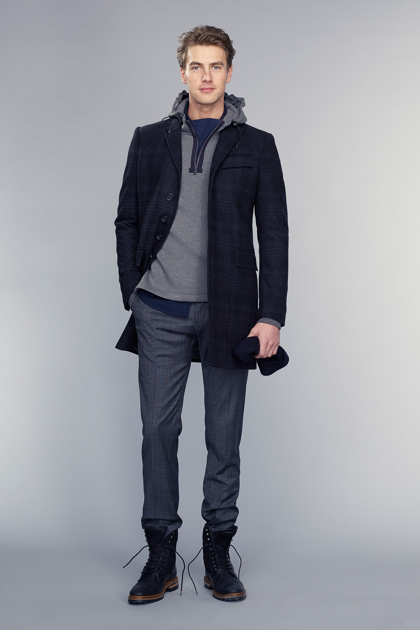 black wool coat with gray hoodie