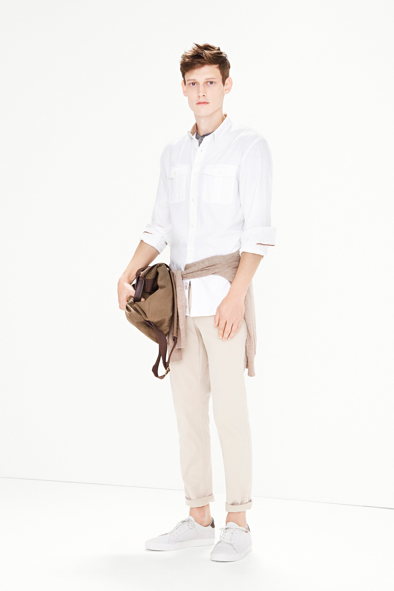 white cotton shirt with beige pants