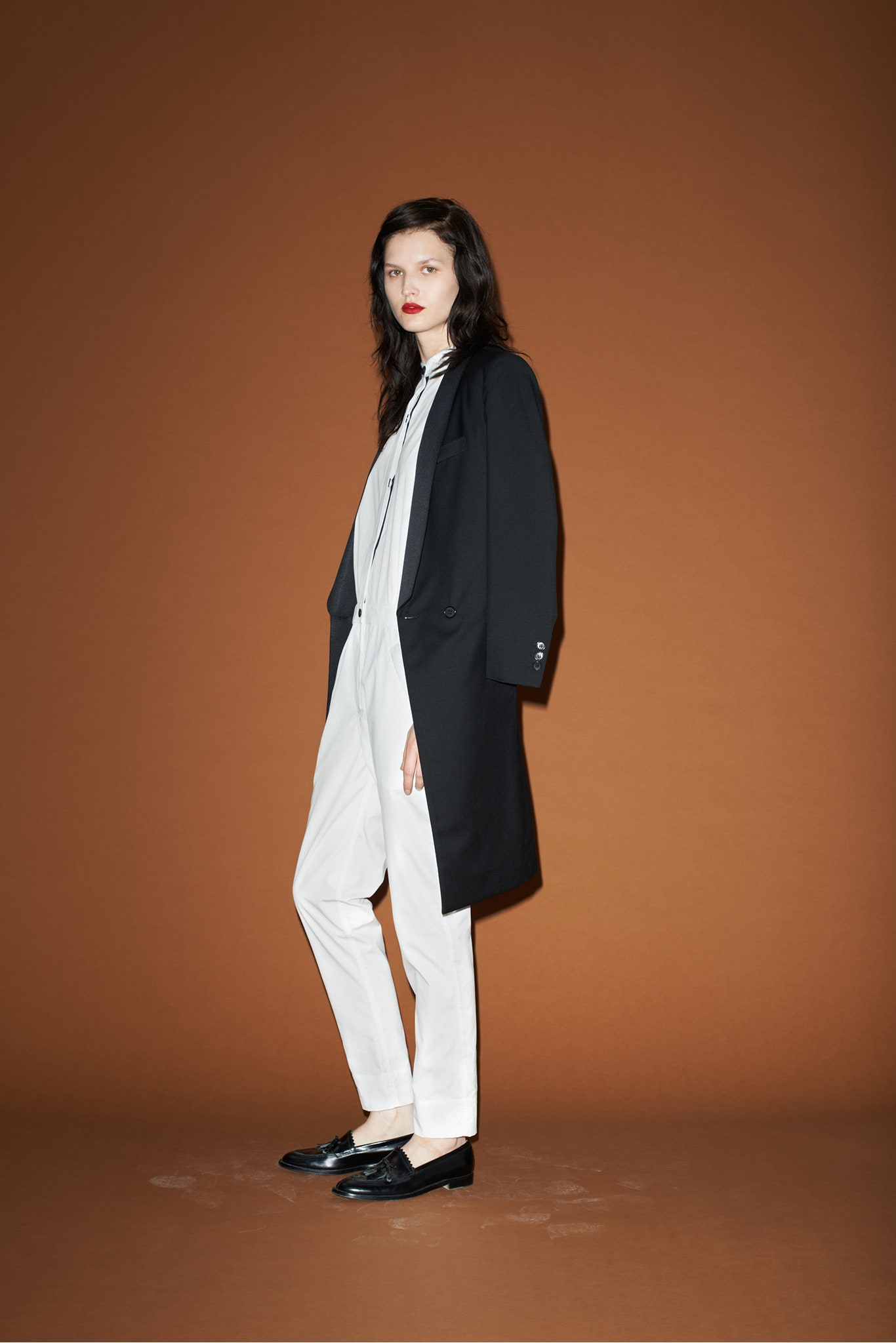black coat white shirt tailored pants
