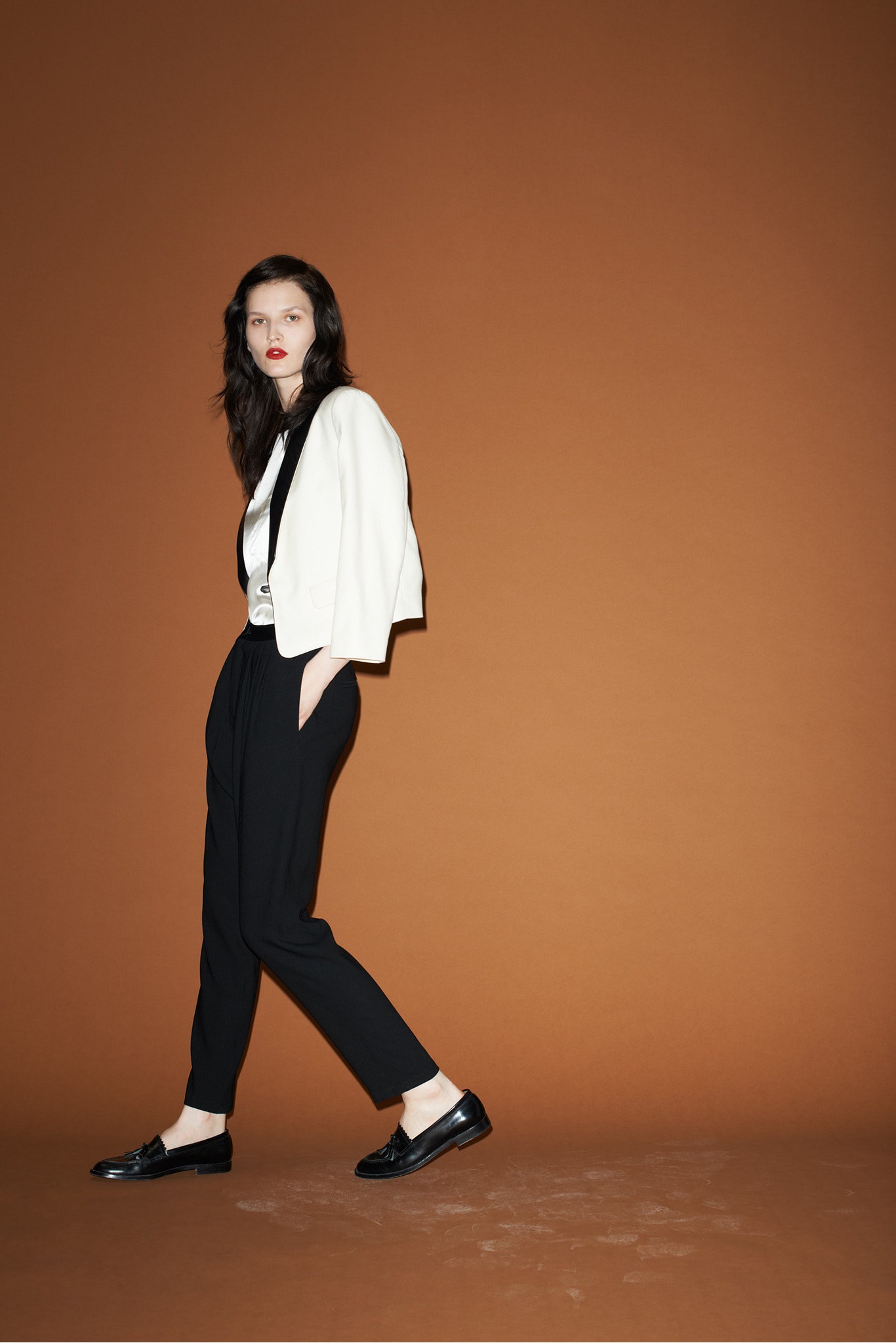 white relaxed jacket with black pants