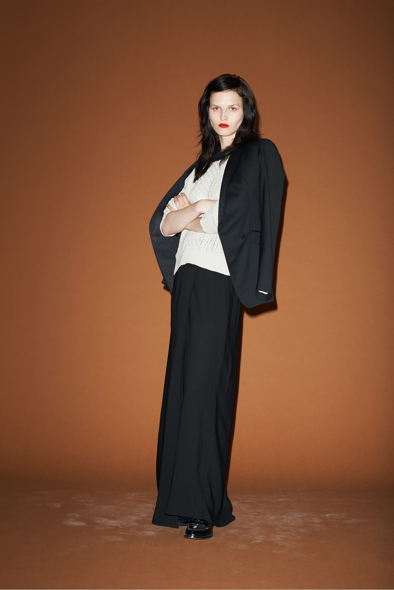 black tailored blazer with white top