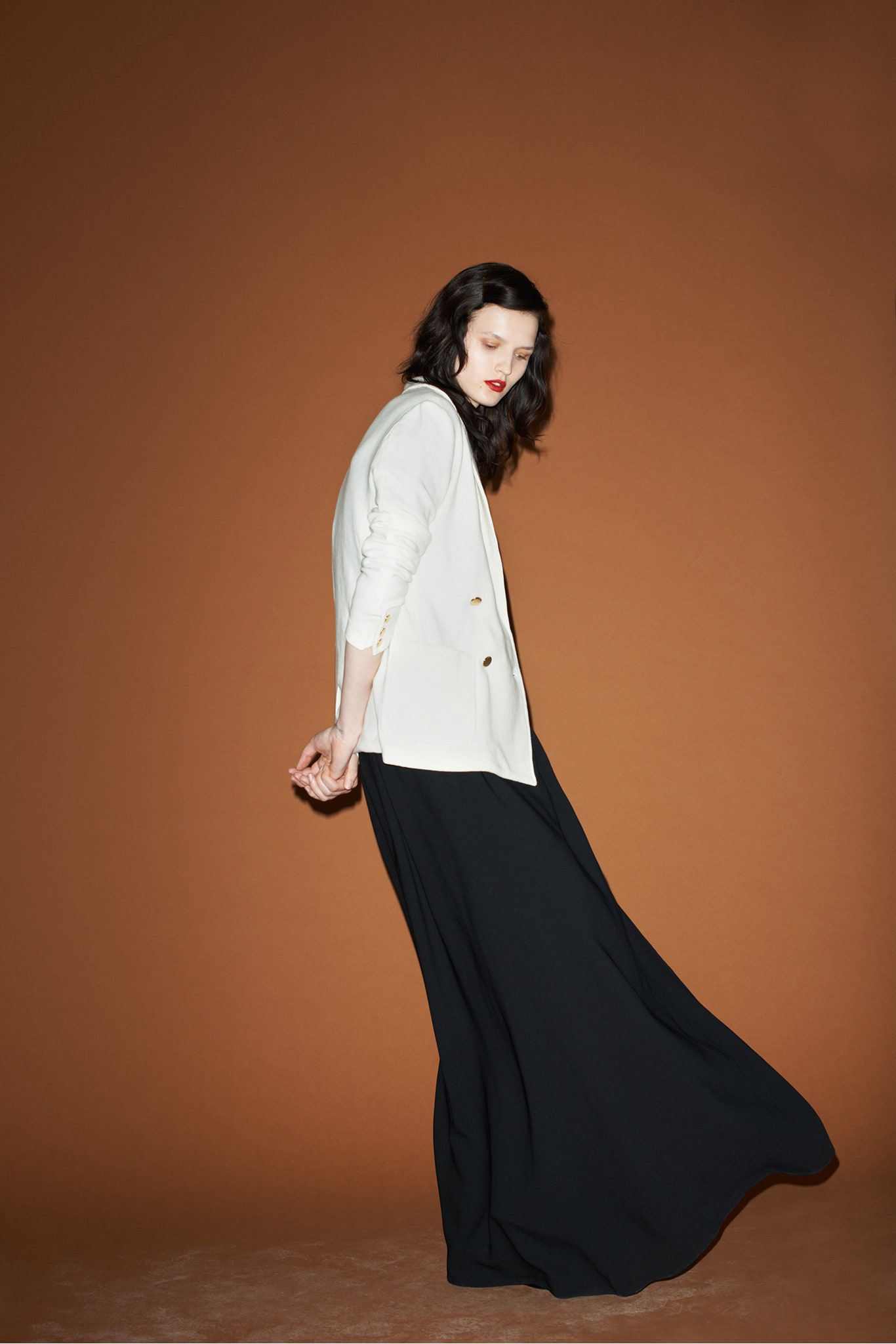 white blazer and black maxi dress