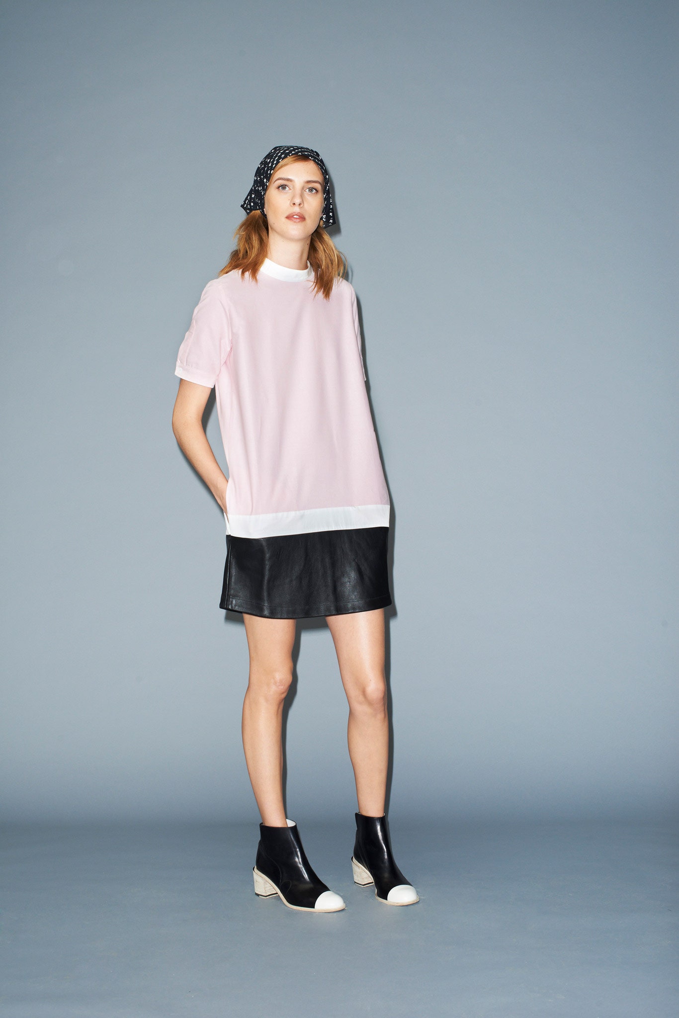 pink cotton top with black leather skirt
