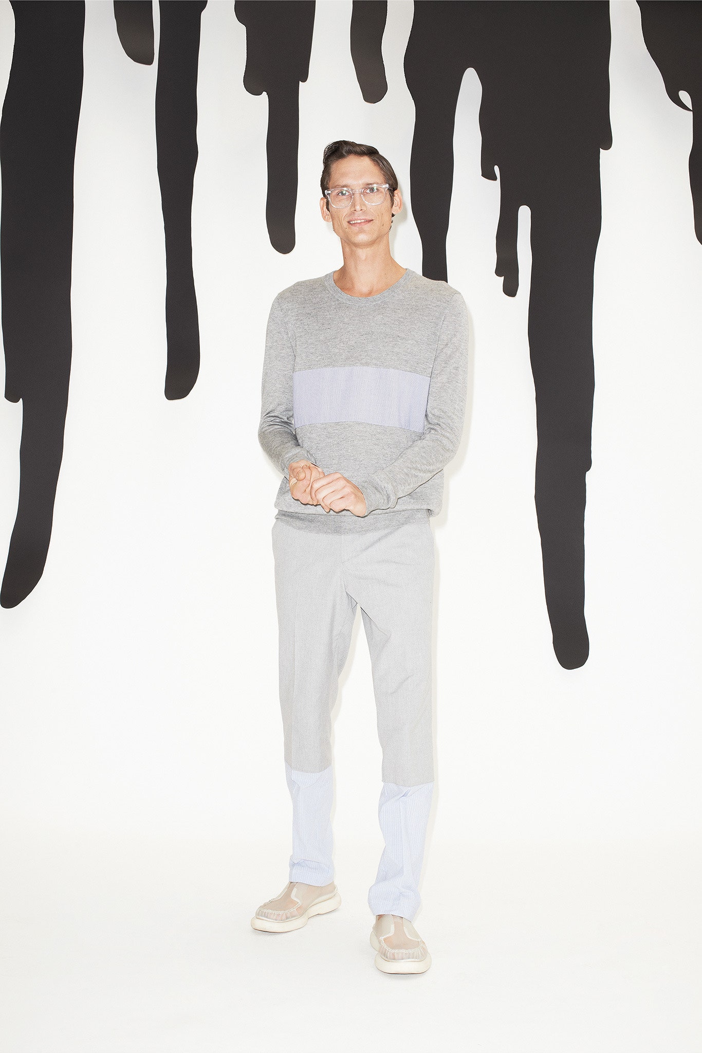 gray striped sweater and tailored pants