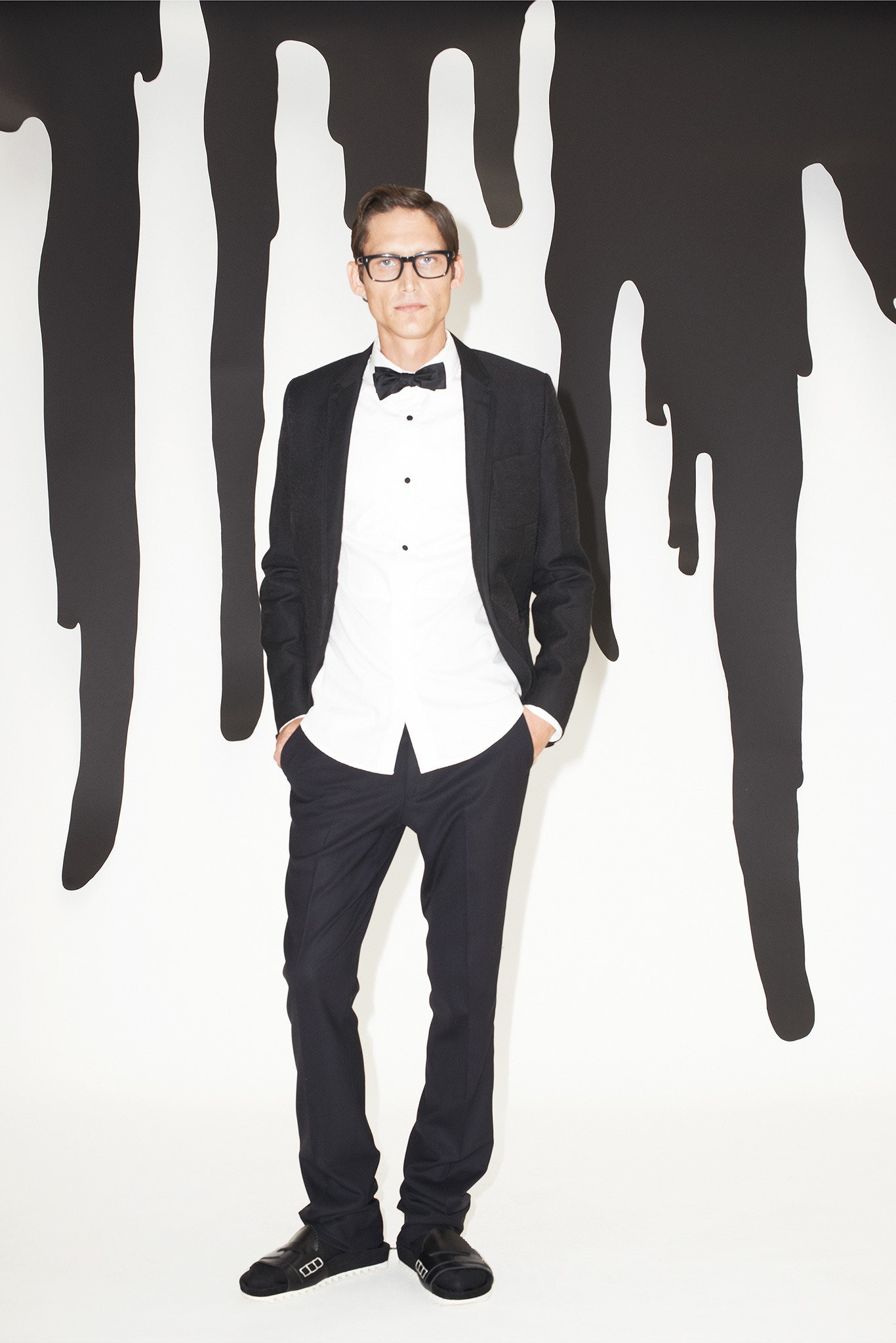 black tailored suit with white shirt