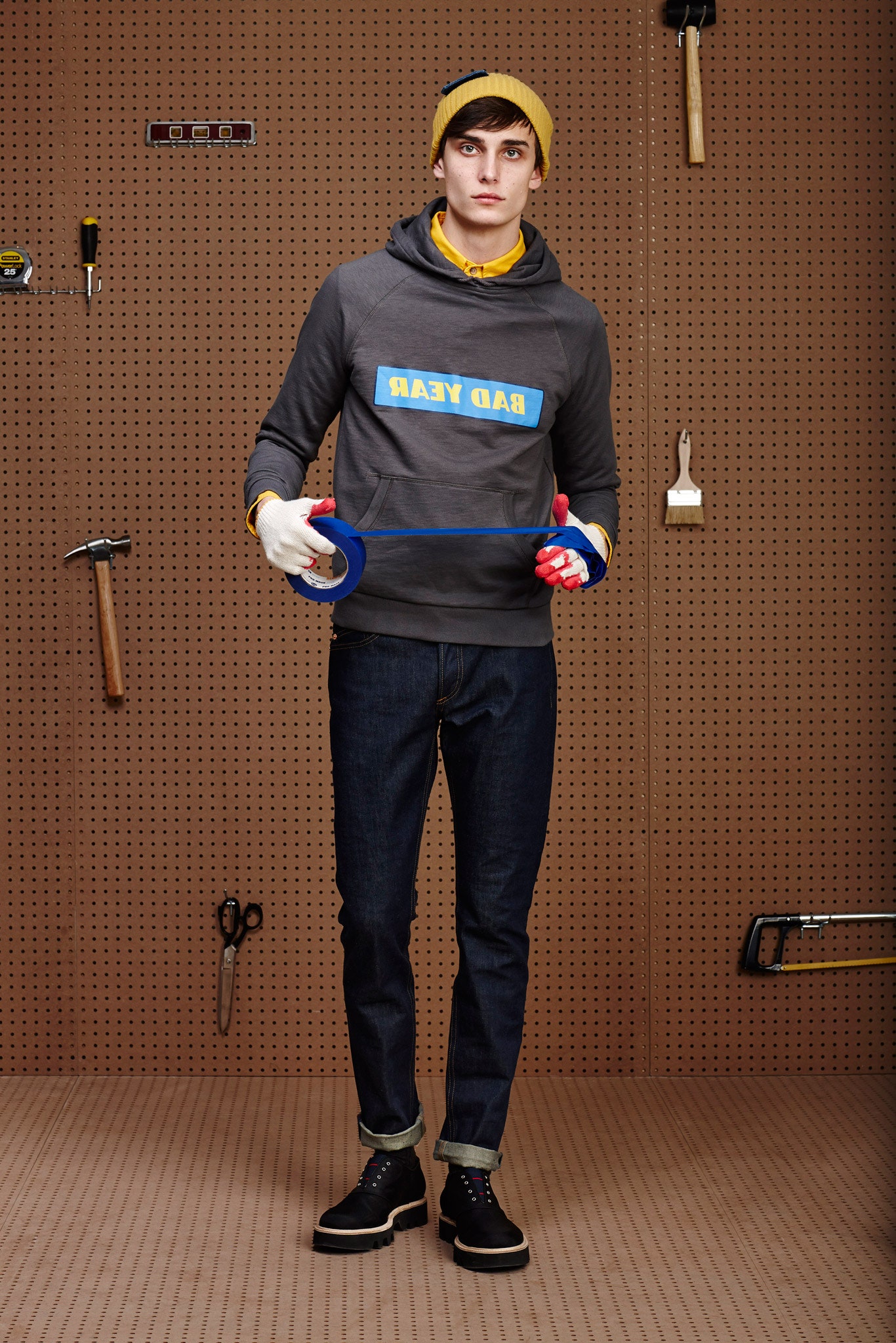 gray hoodie with yellow t-shirt