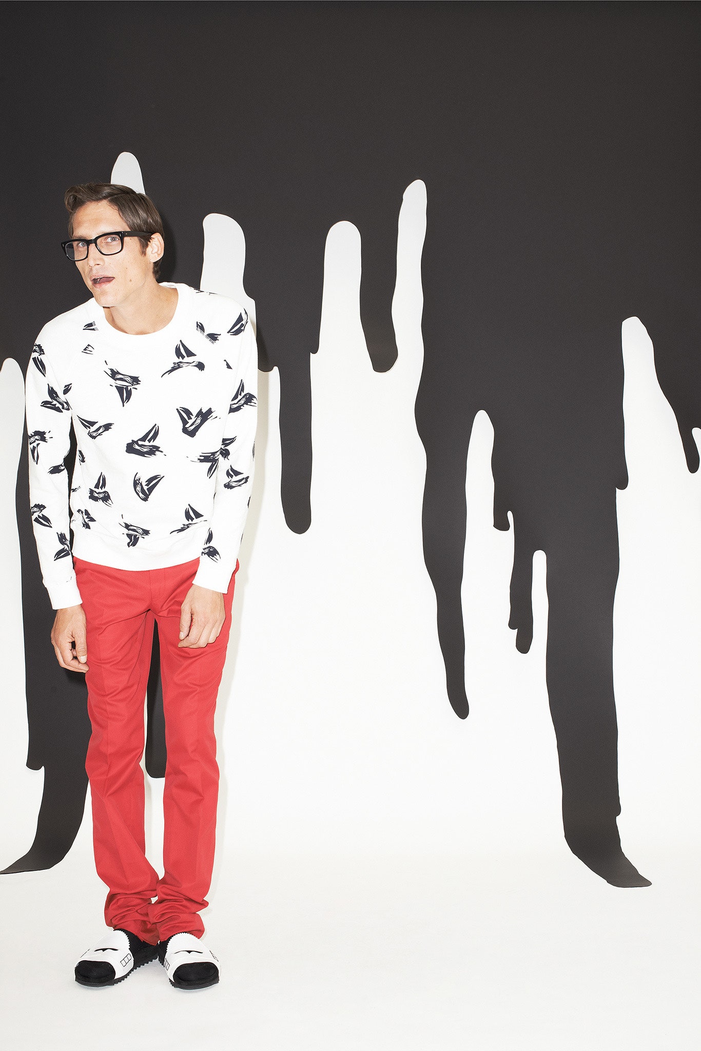 white printed top with red pants