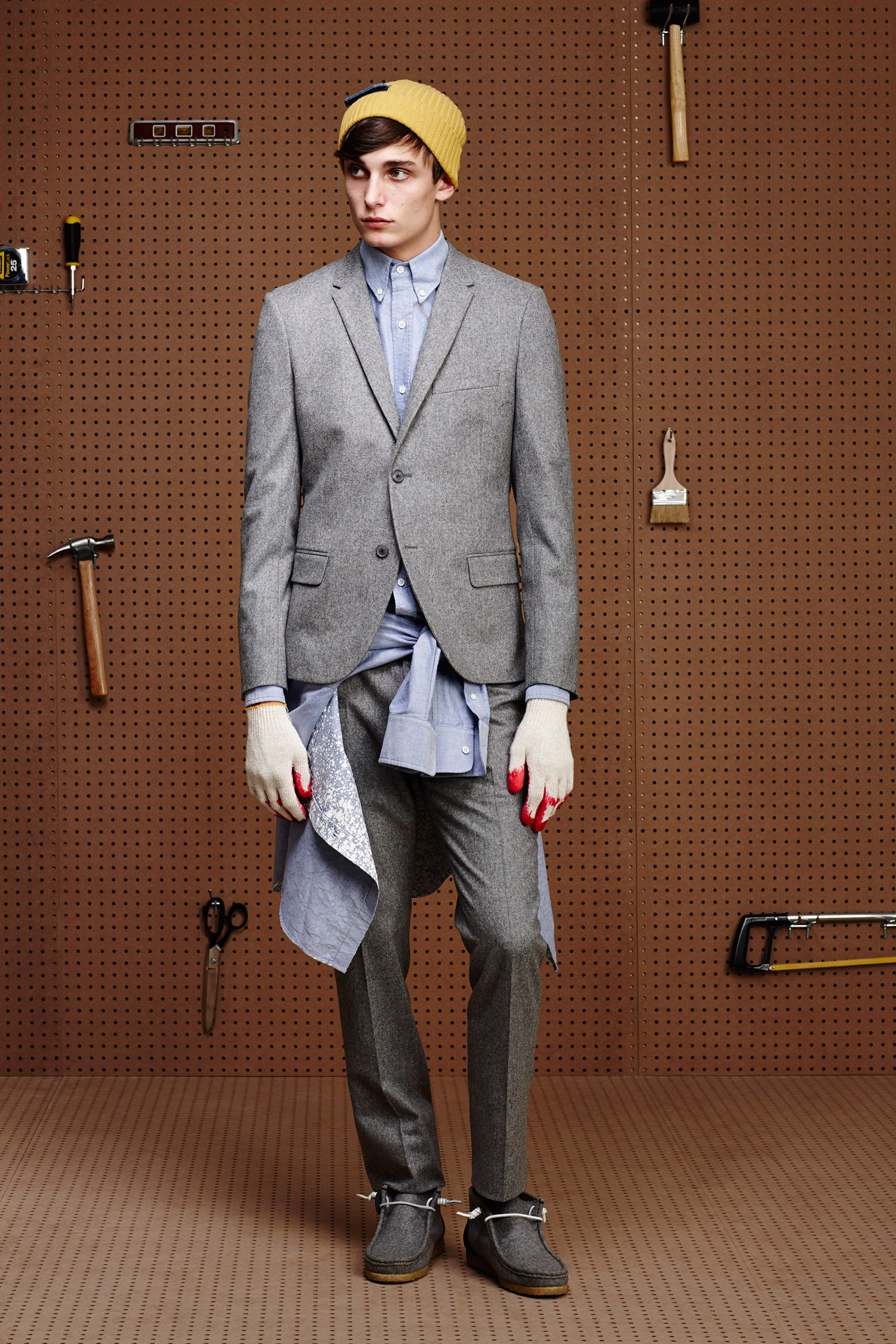 gray tailored suit with blue shirt