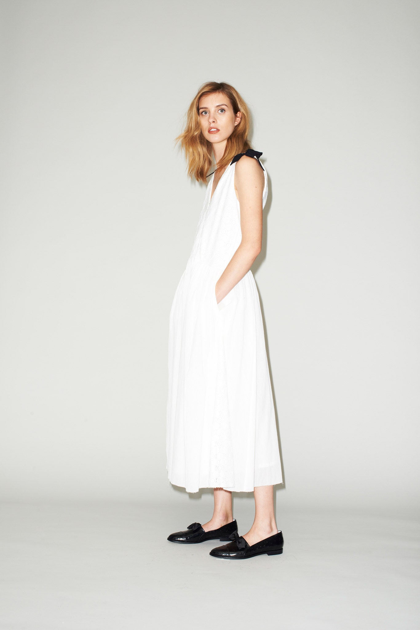 white midi dress with black shoes