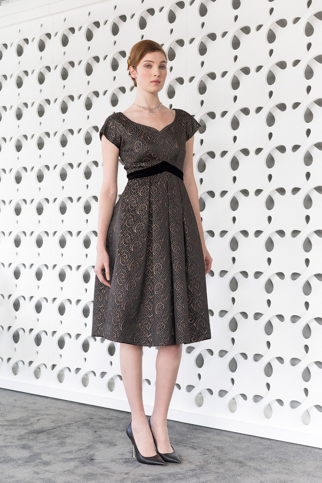 black and gold pleated midi dress