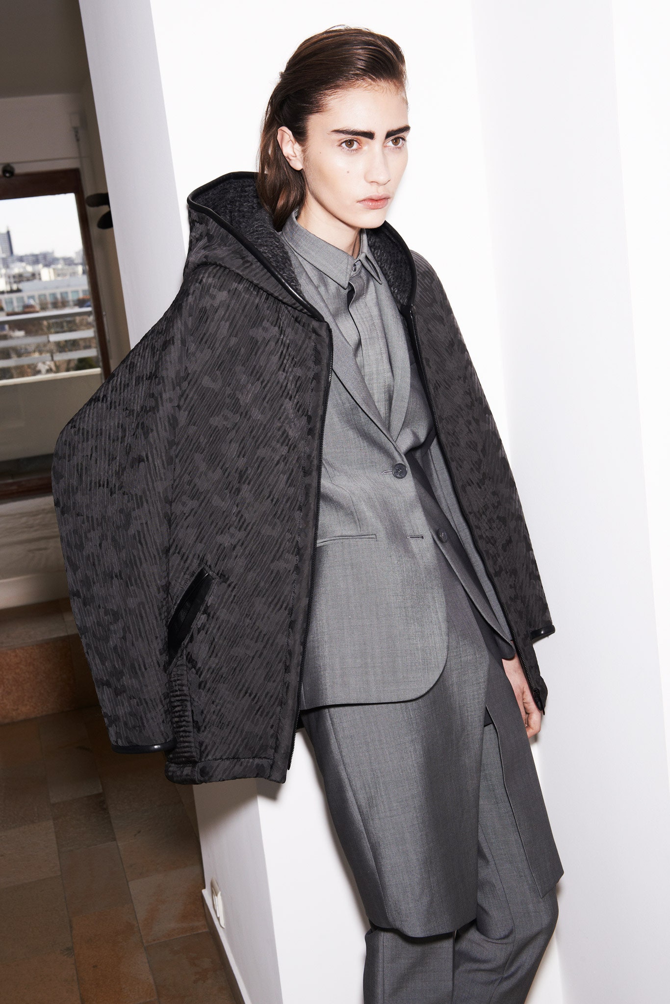 black jacket gray suit and shirt