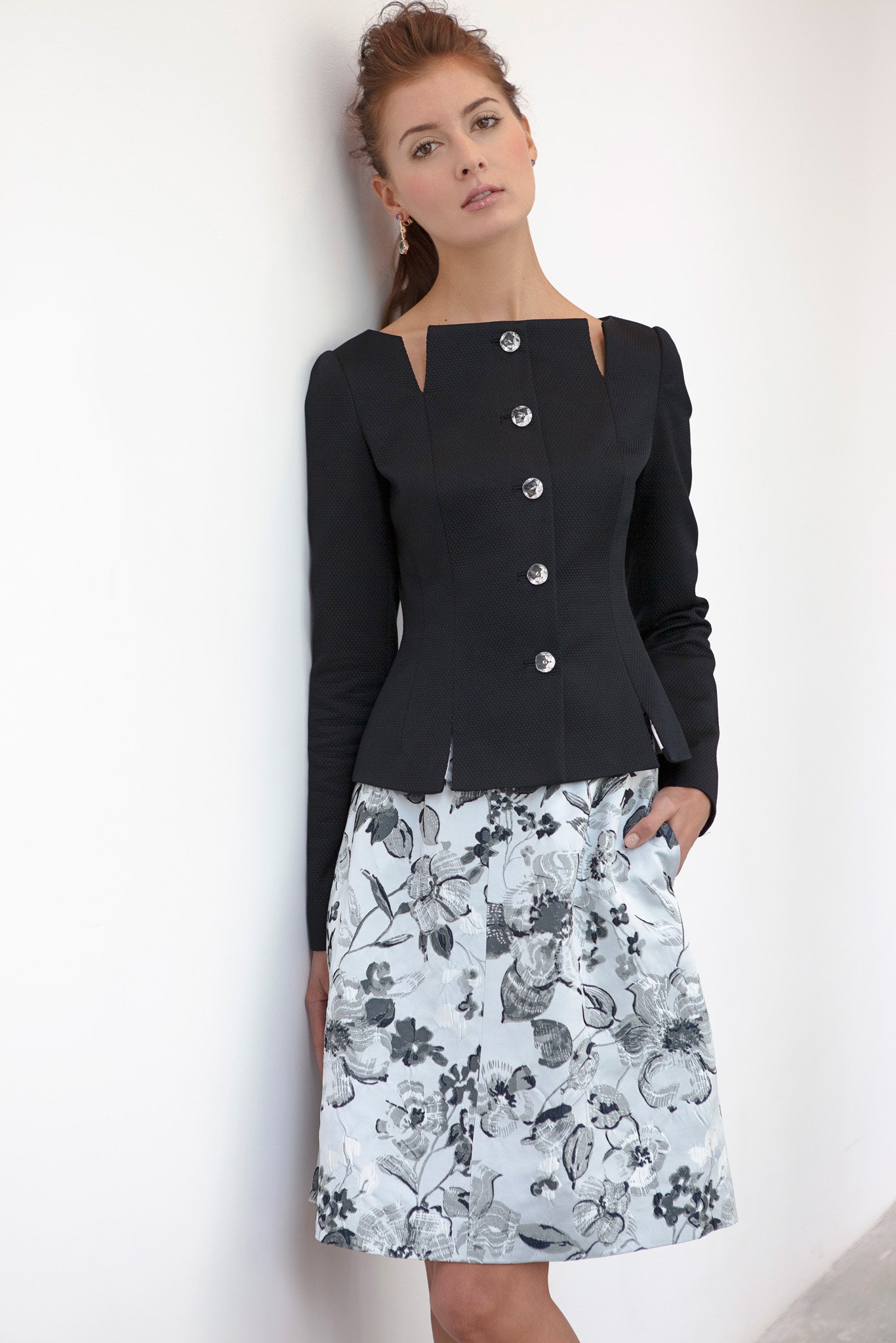 black fitted blazer with floral skirt