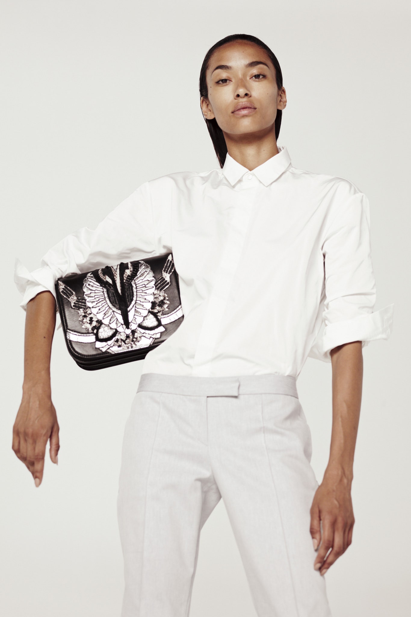 white fitted shirt gray tailored pants