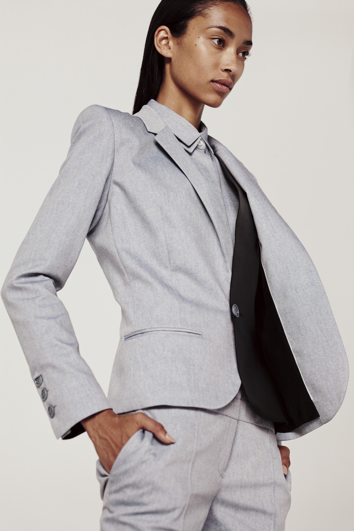 gray tailored blazer with blue shirt