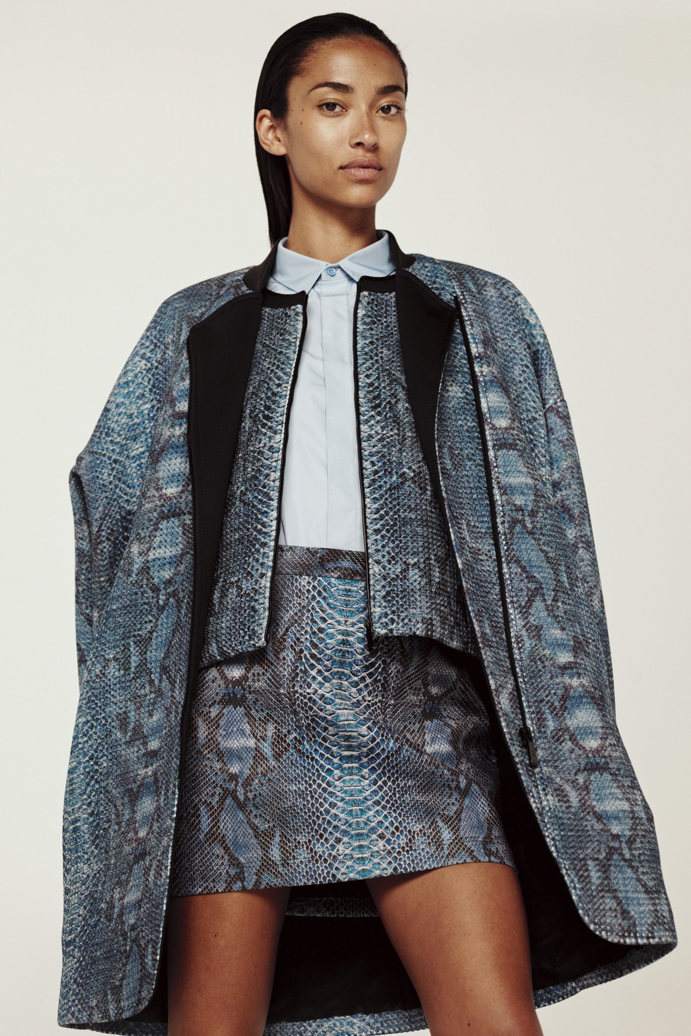 blue printed coat with blouse and skirt