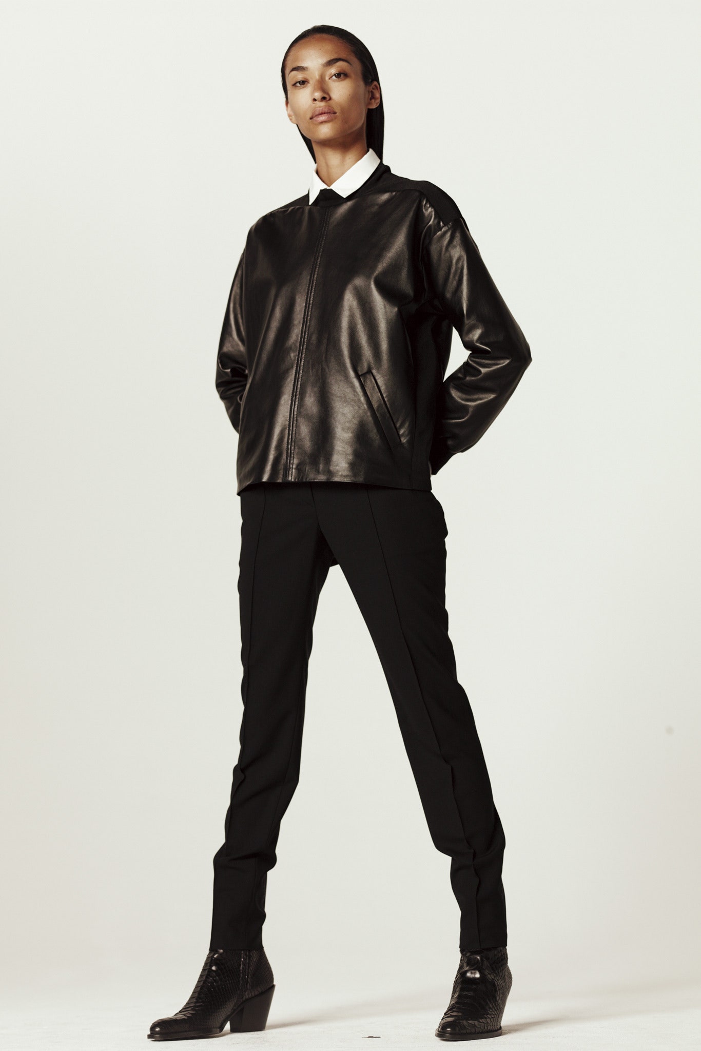 black leather jacket and tailored pants