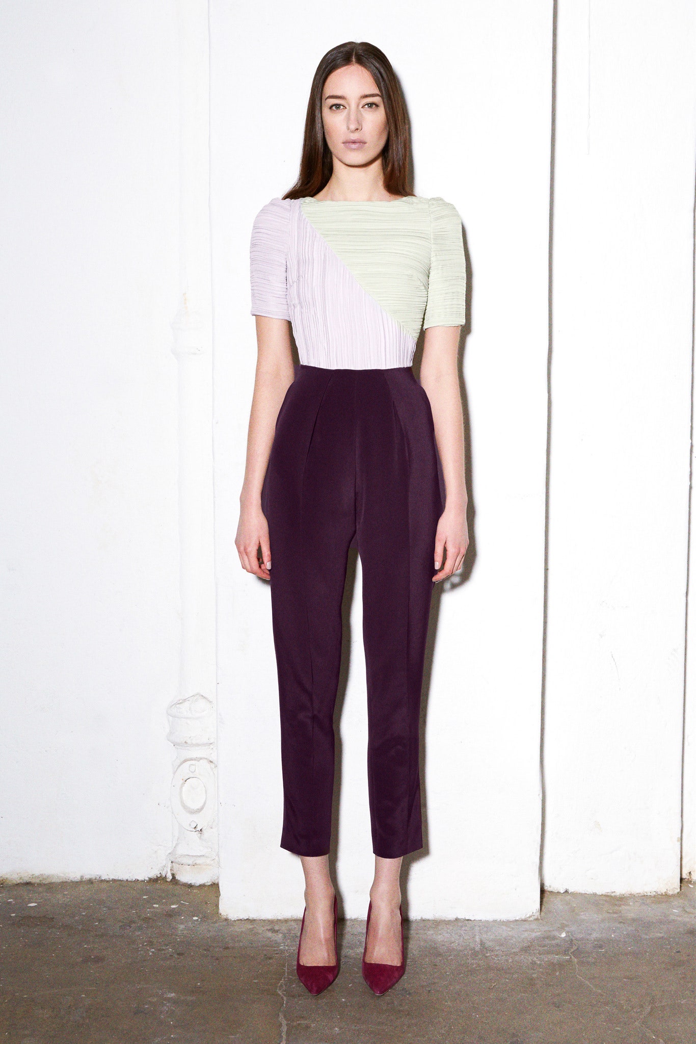 fitted green and purple top with pants