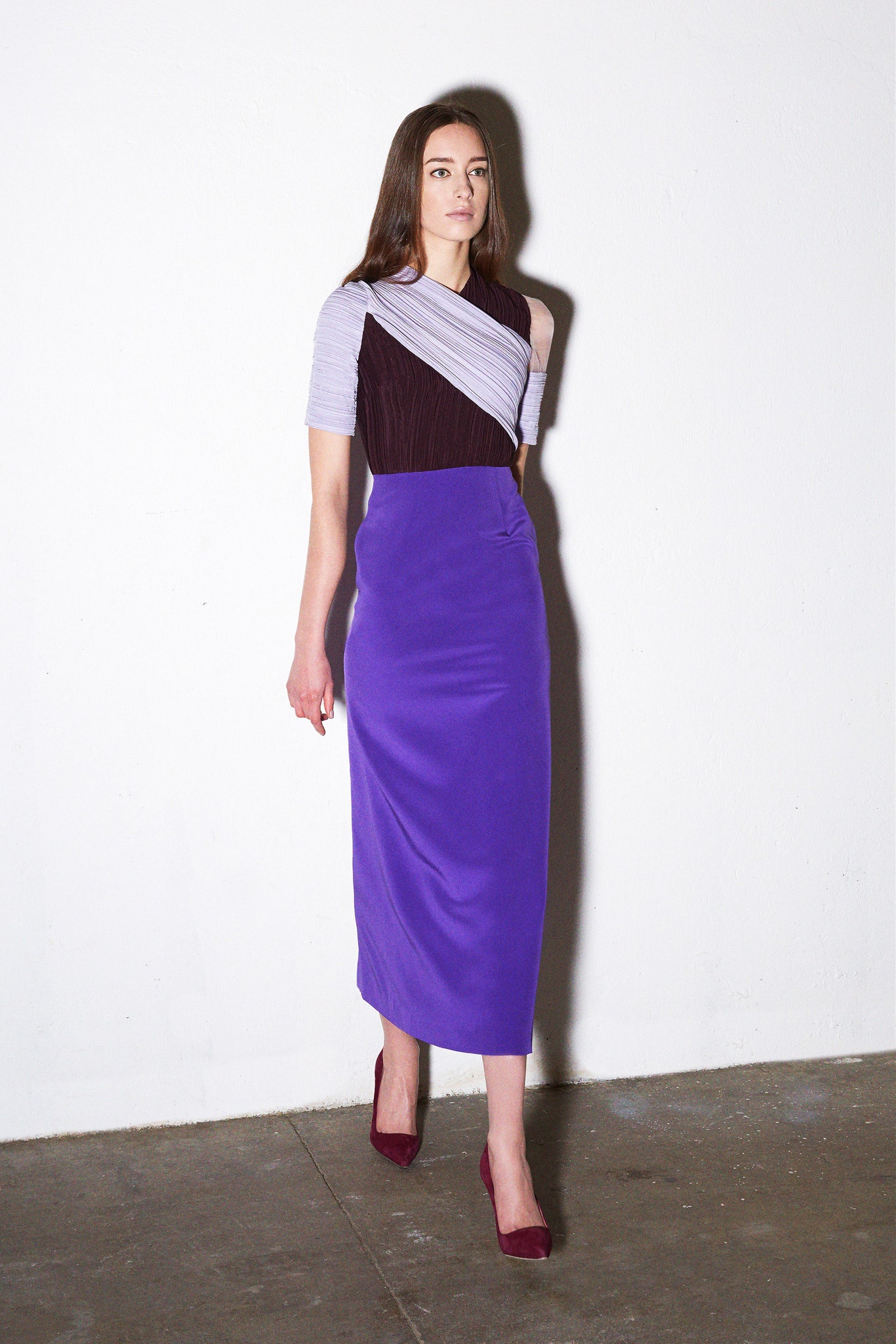 fitted purple top and midi skirt