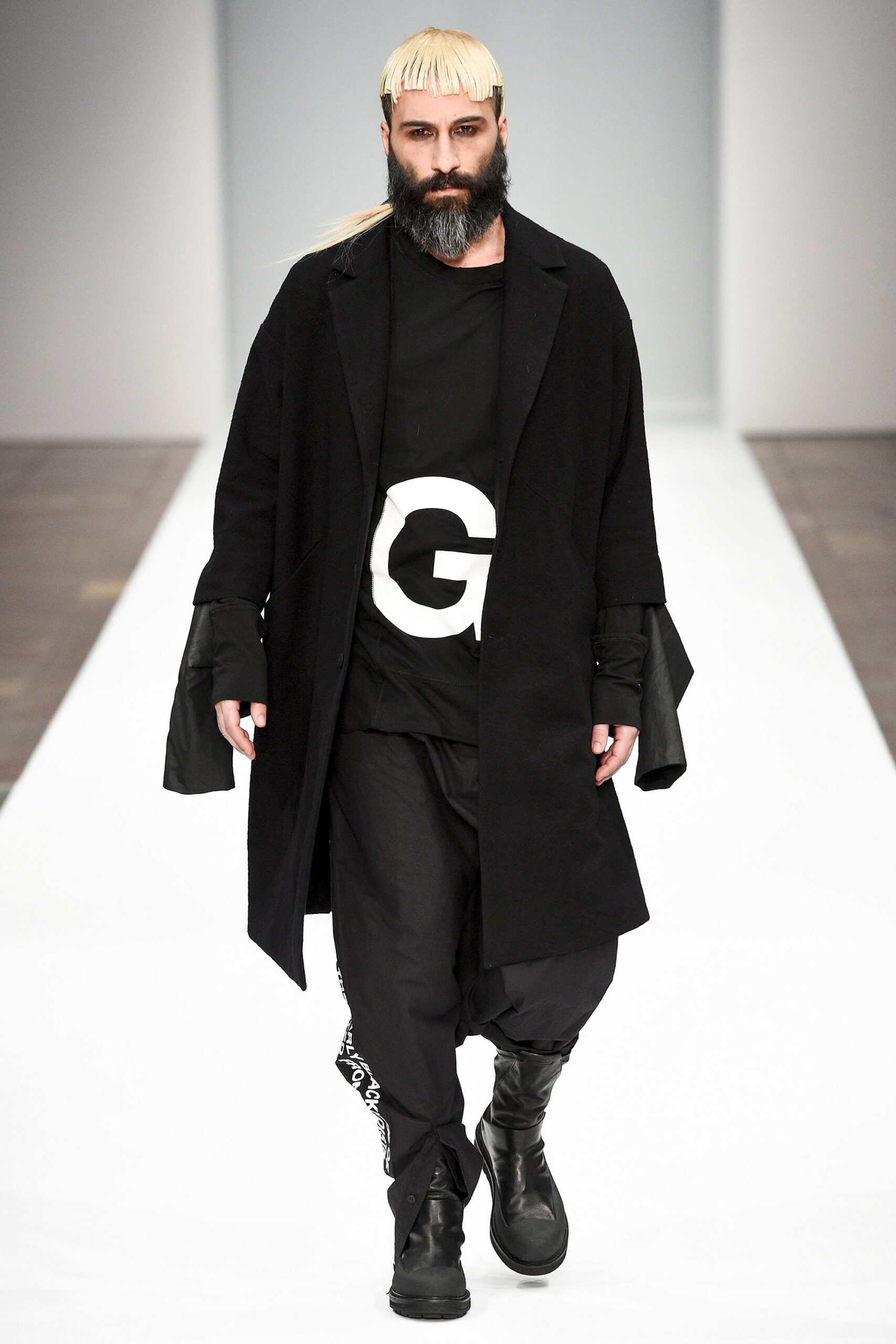 black coat and t-shirt outfit