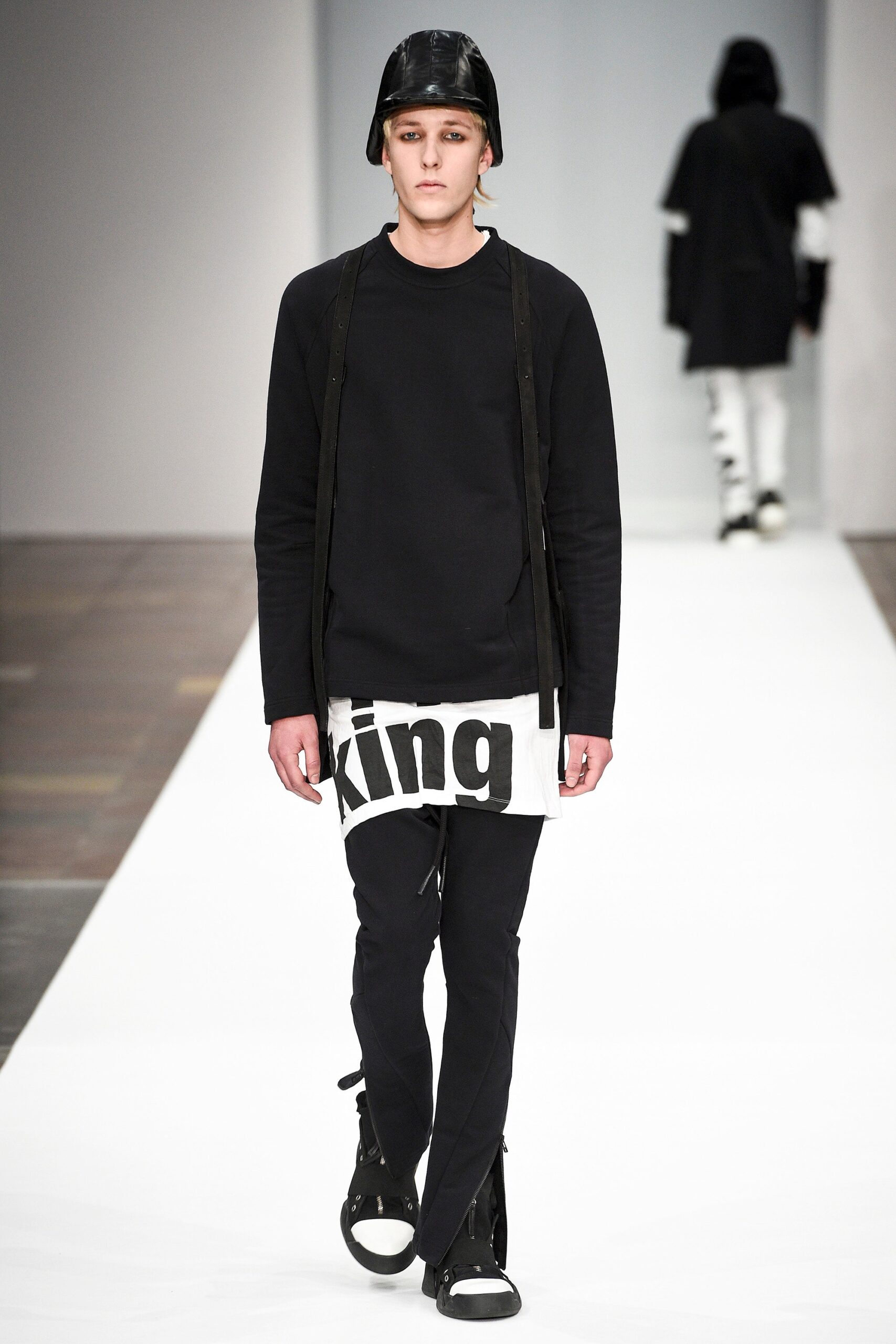 black fitted top with slim pants