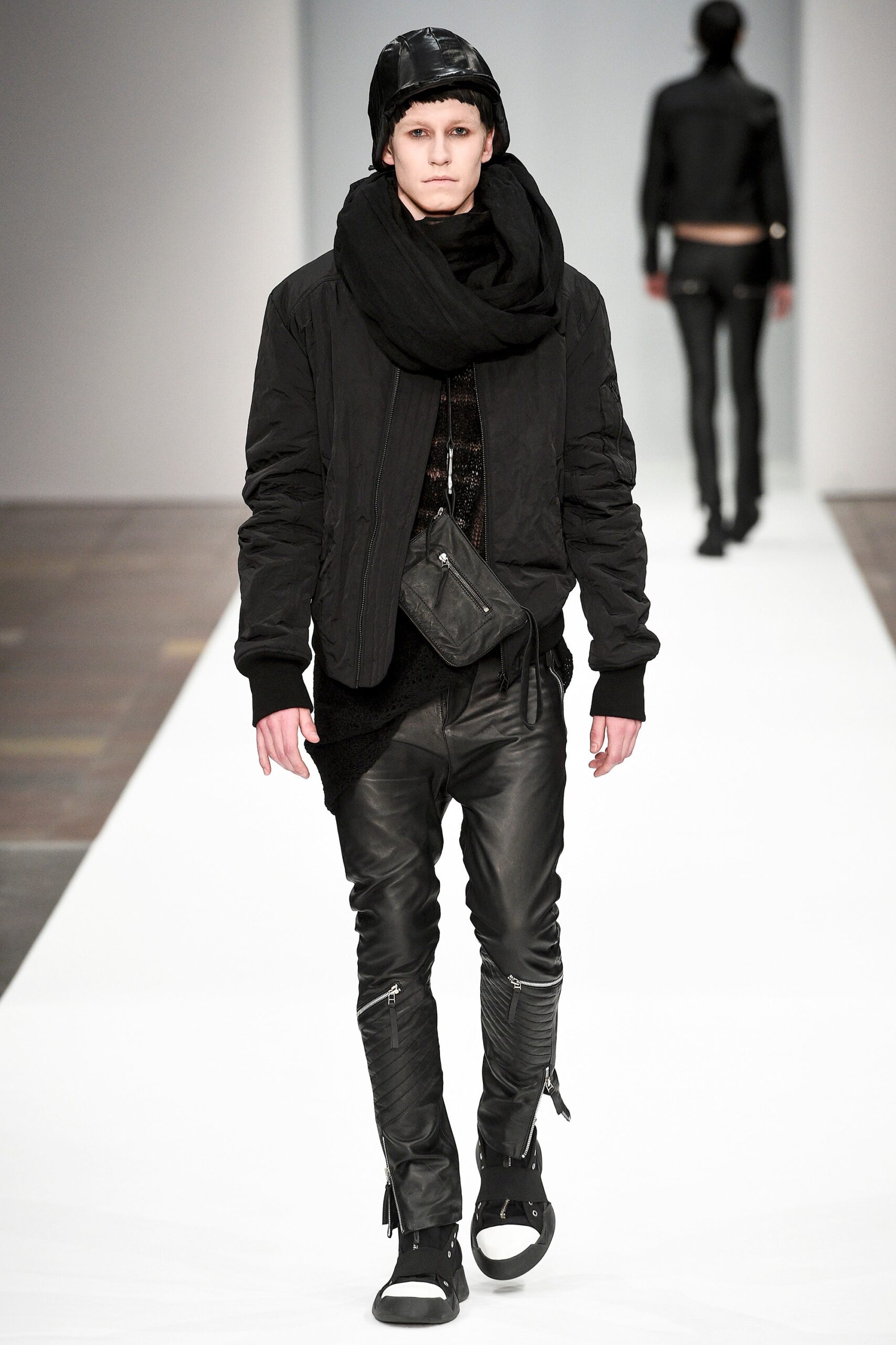 black fitted jacket and leather pants