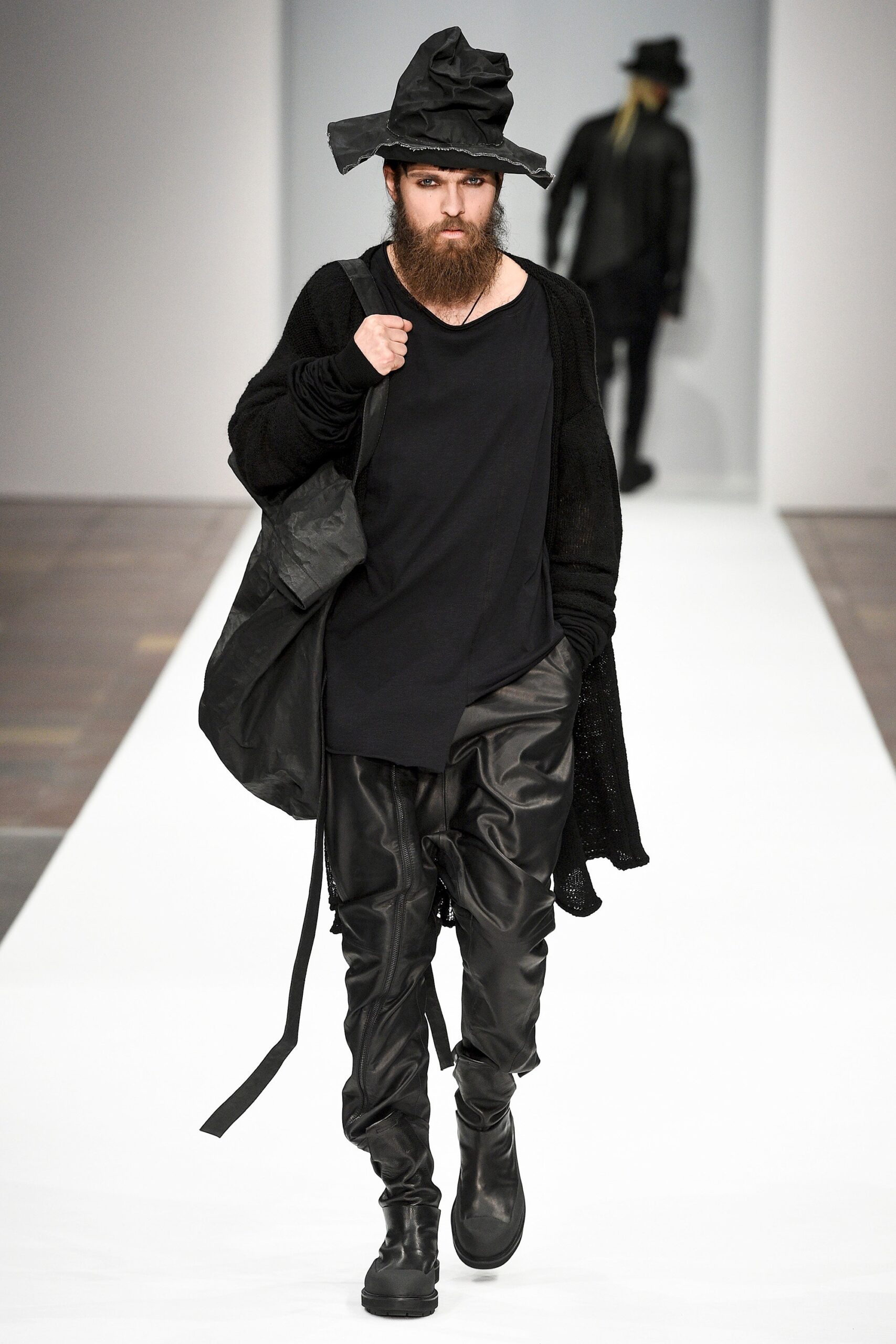 black relaxed top with leather pants