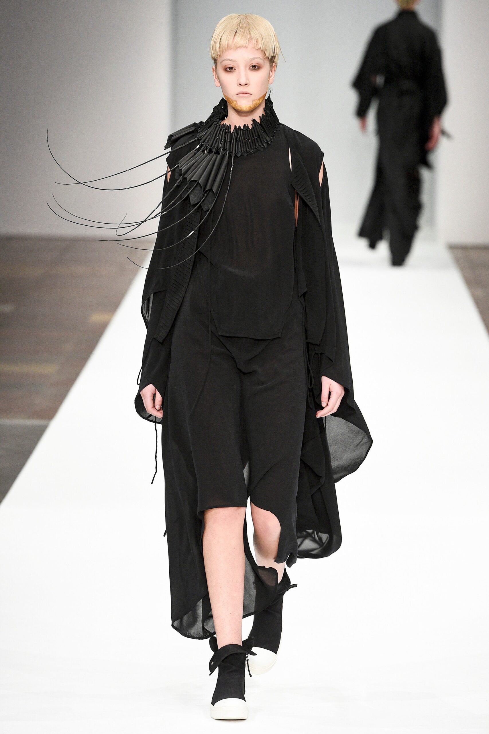 black silk fitted dress with cape