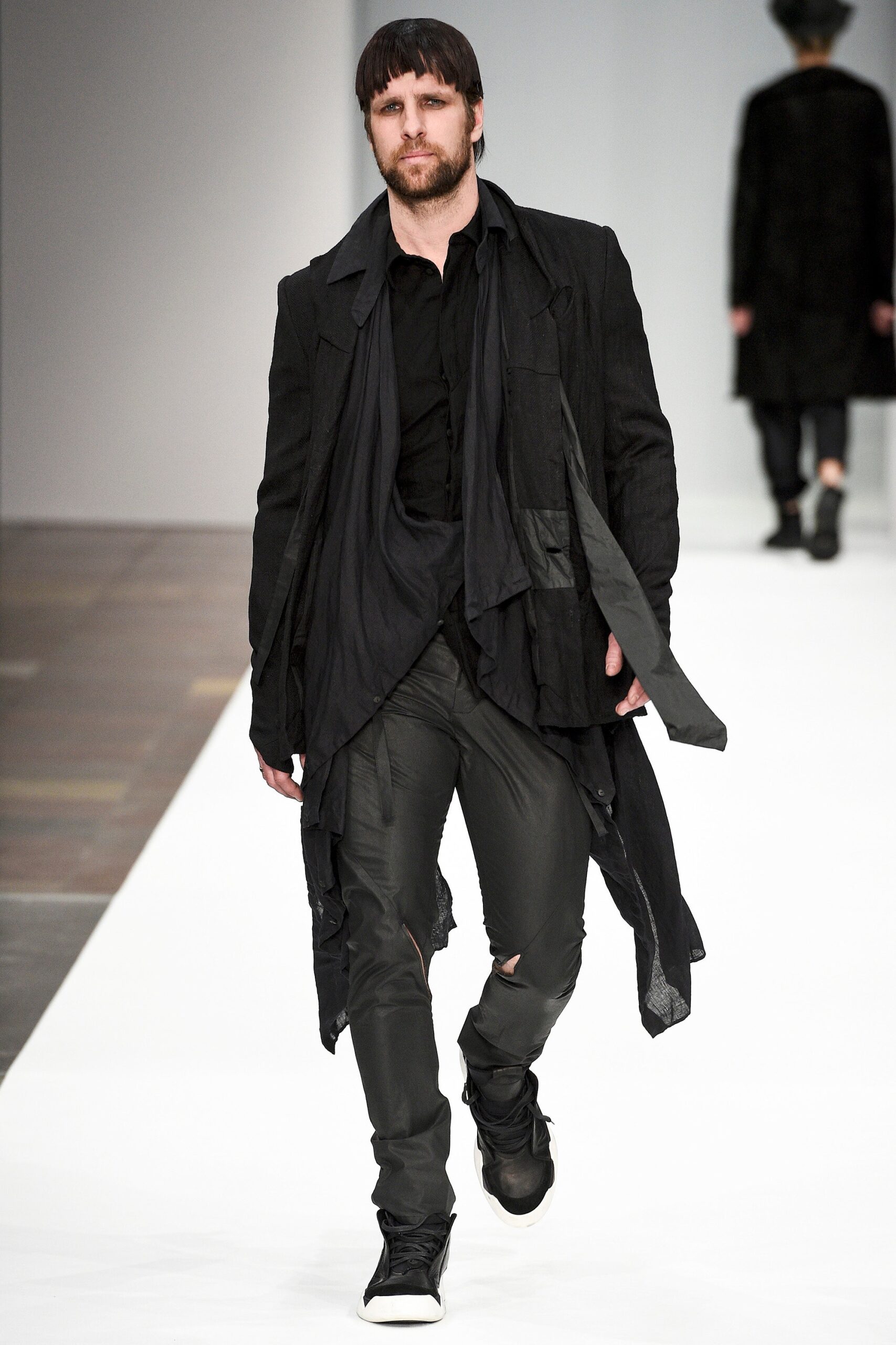black relaxed coat with slim pants