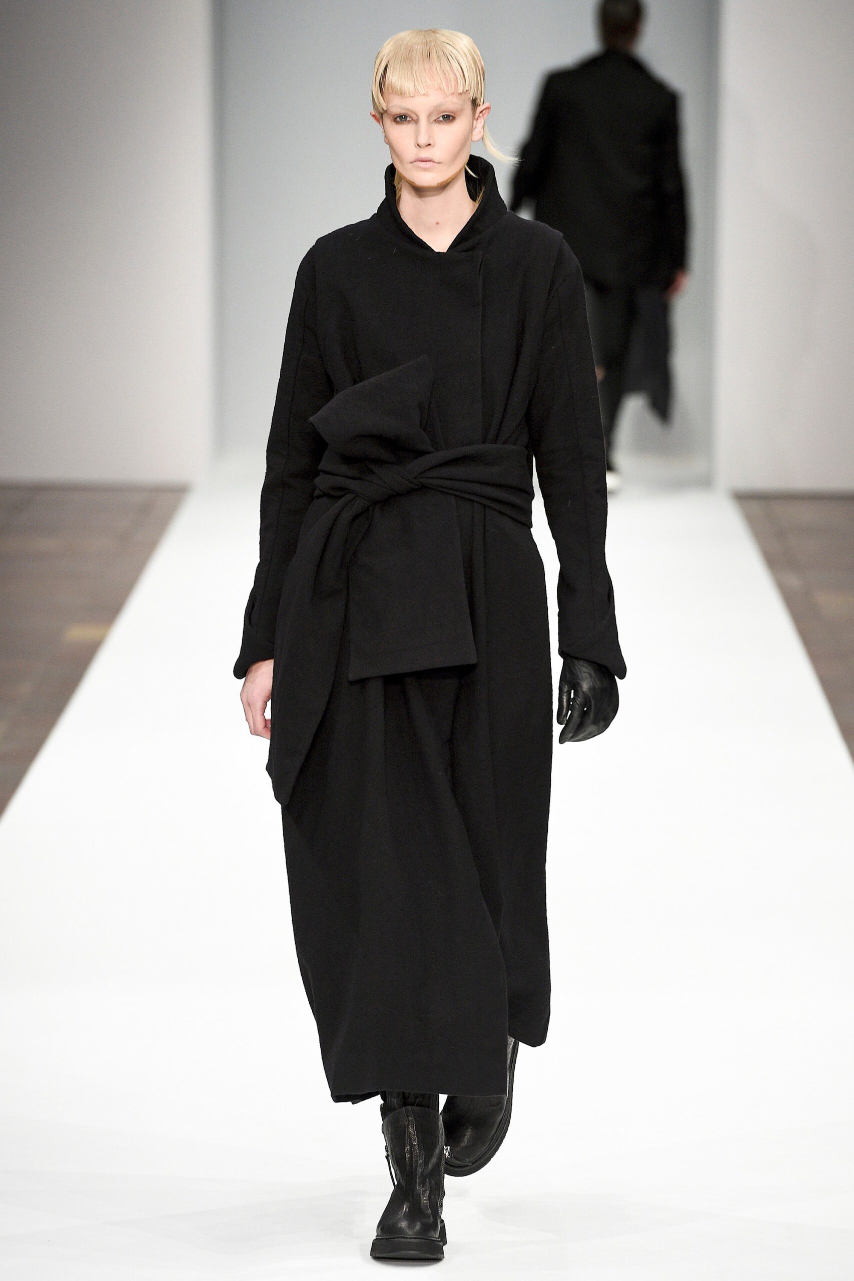 black relaxed midi dress with gloves and boots