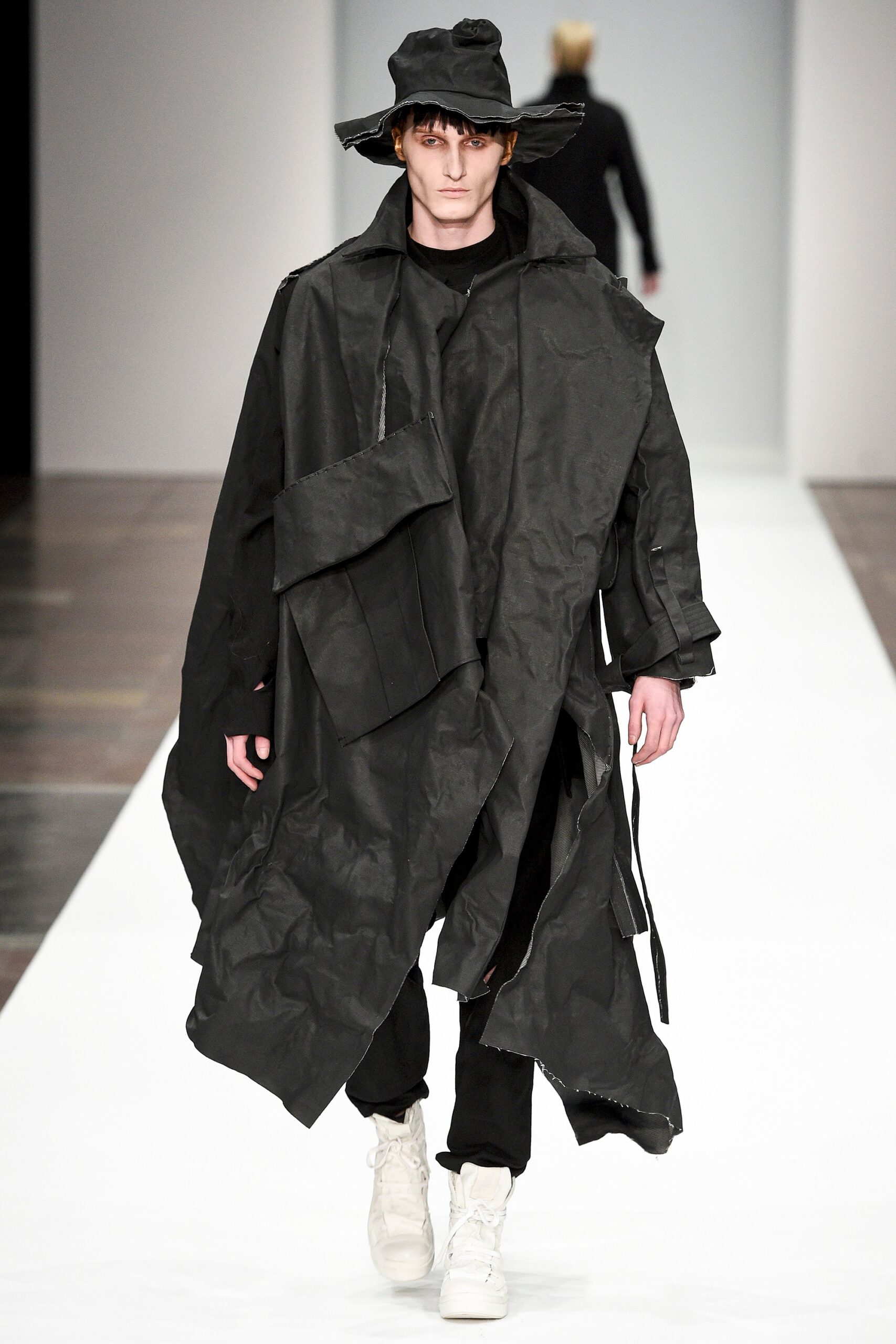 oversized black coat with relaxed pants