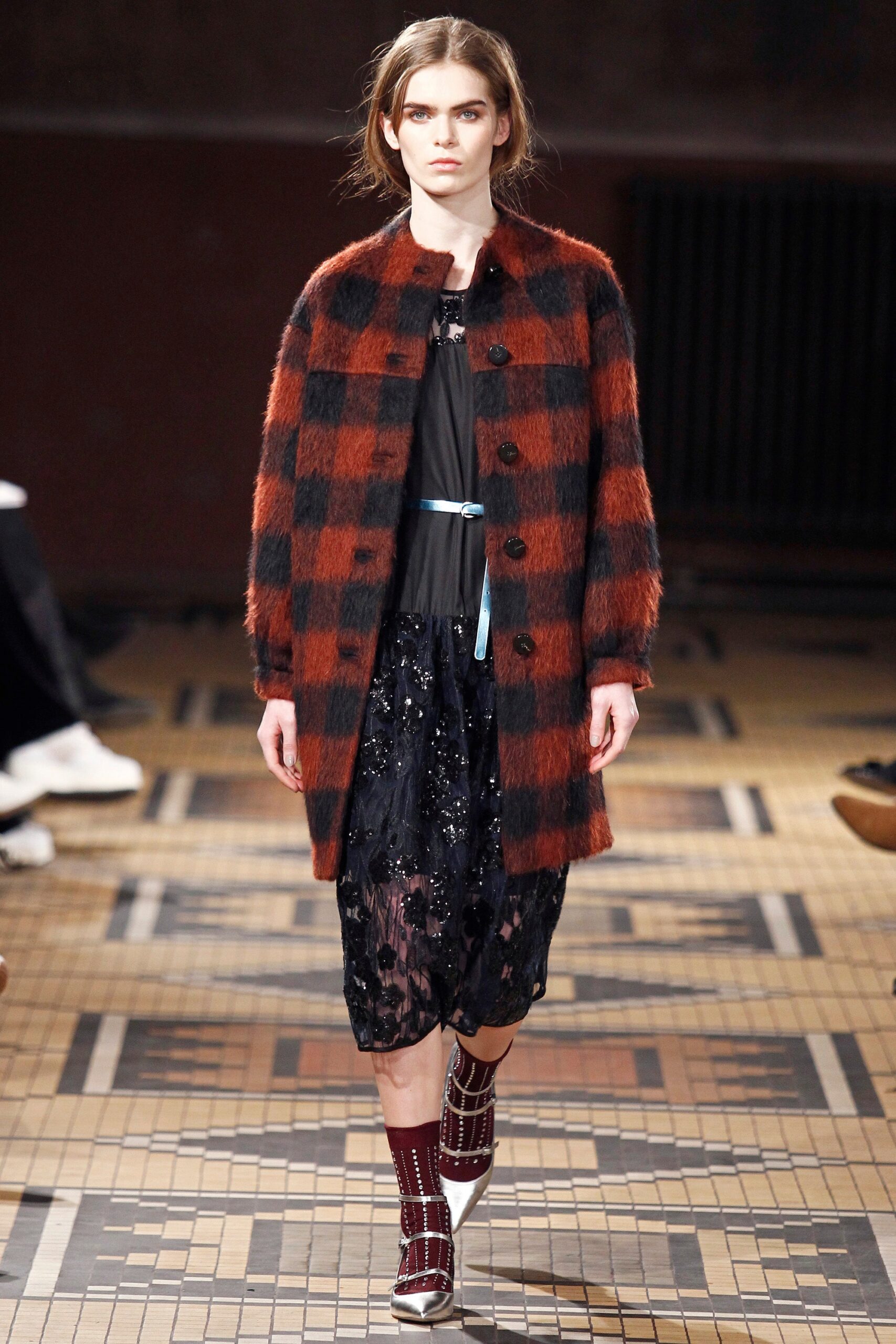 red black checked coat and black dress