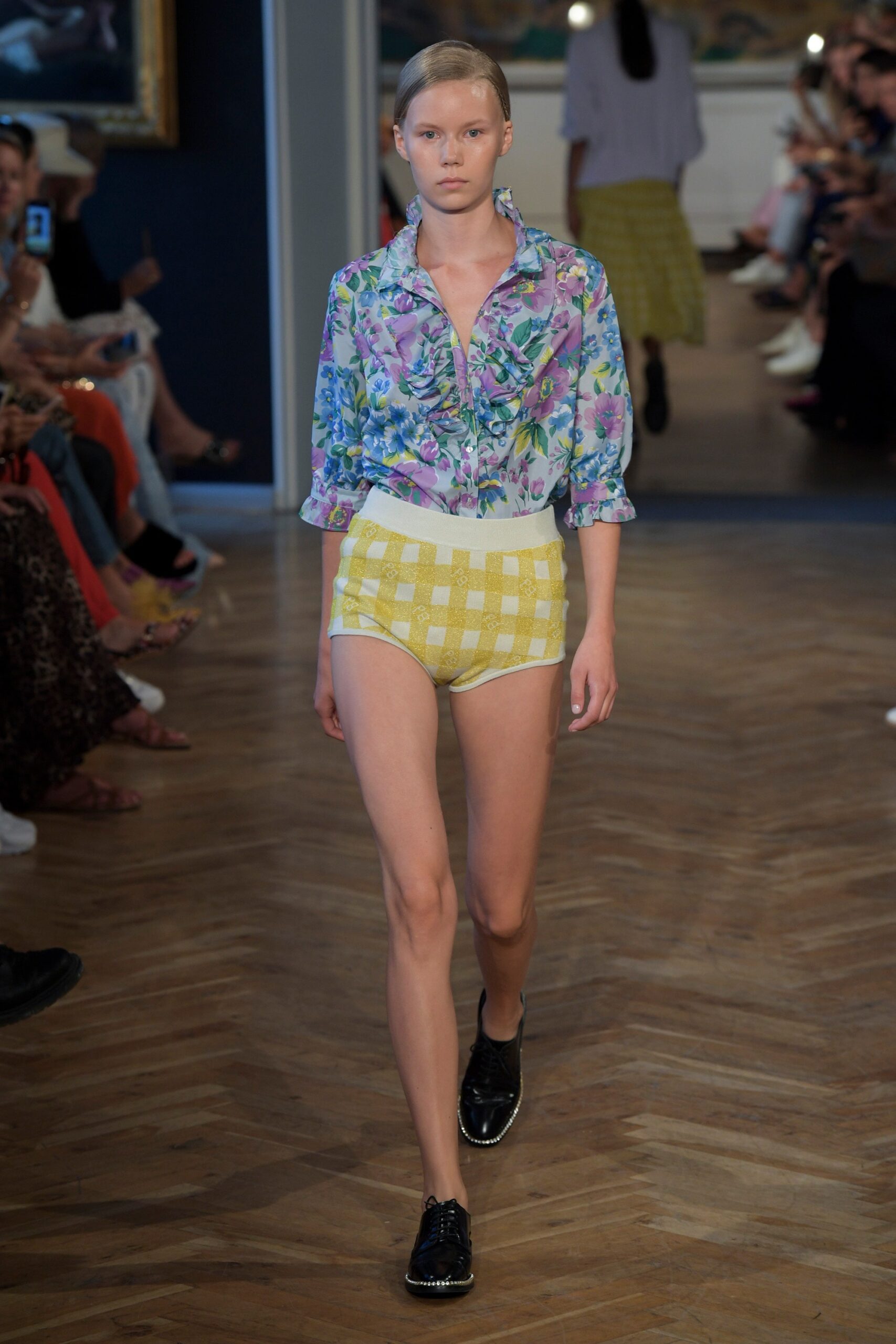 floral shirt and checked shorts