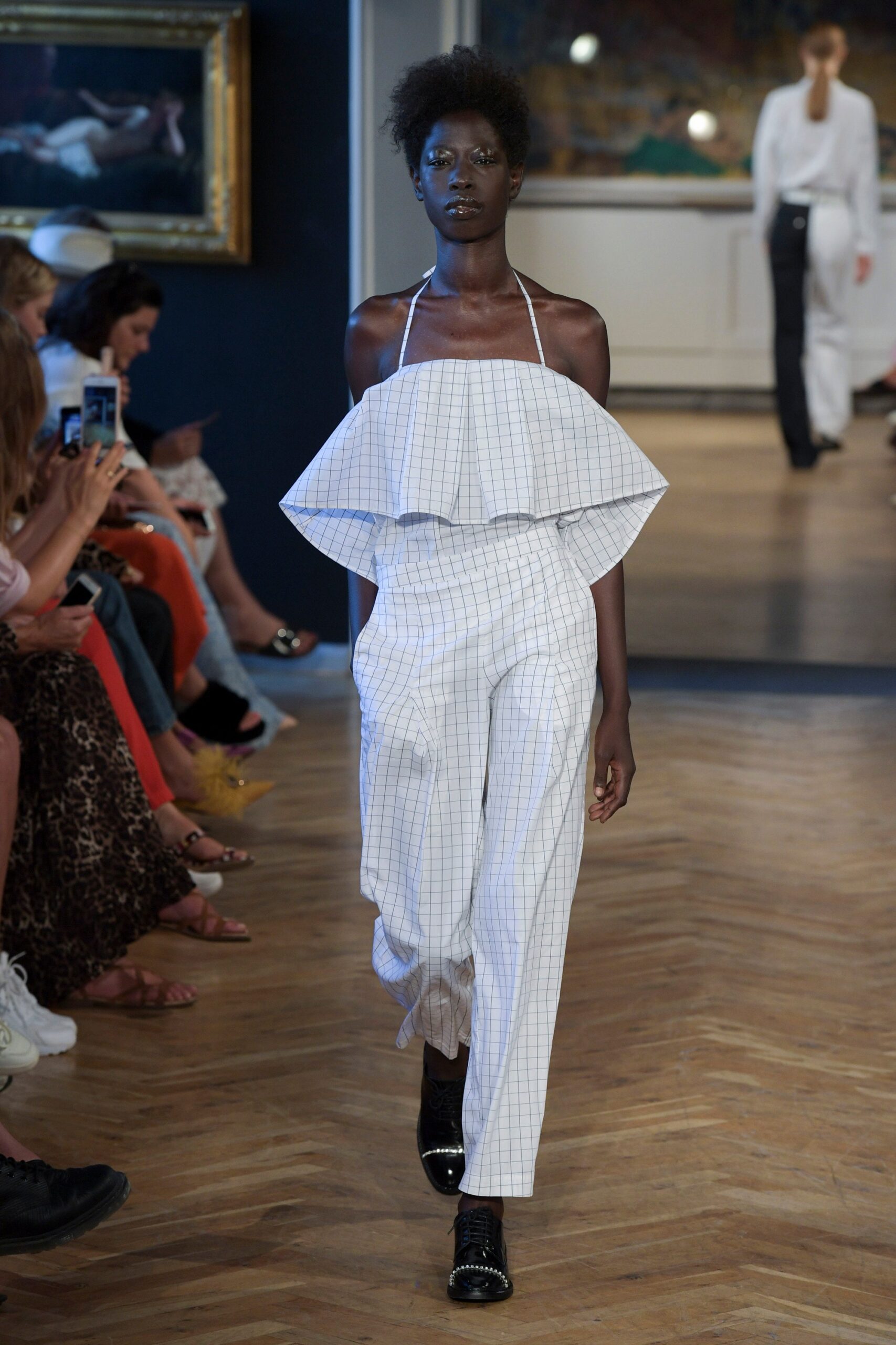 white and black pleated jumpsuit