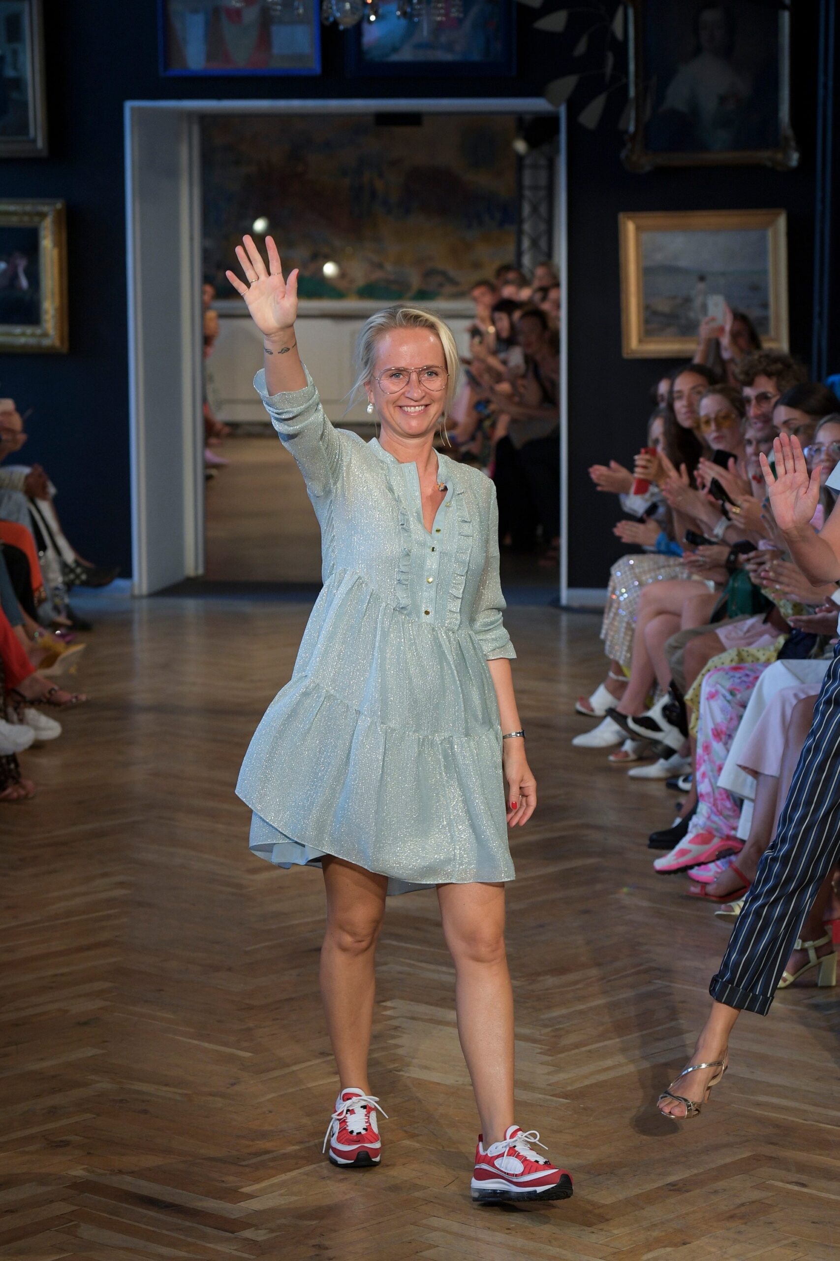 light blue tiered dress with sporty shoes