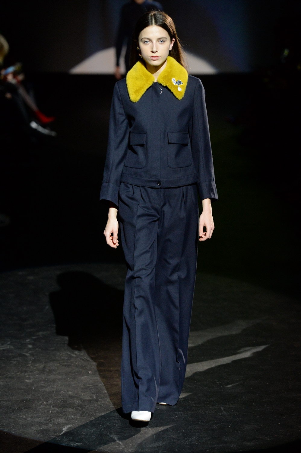 navy tailored suit with yellow collar