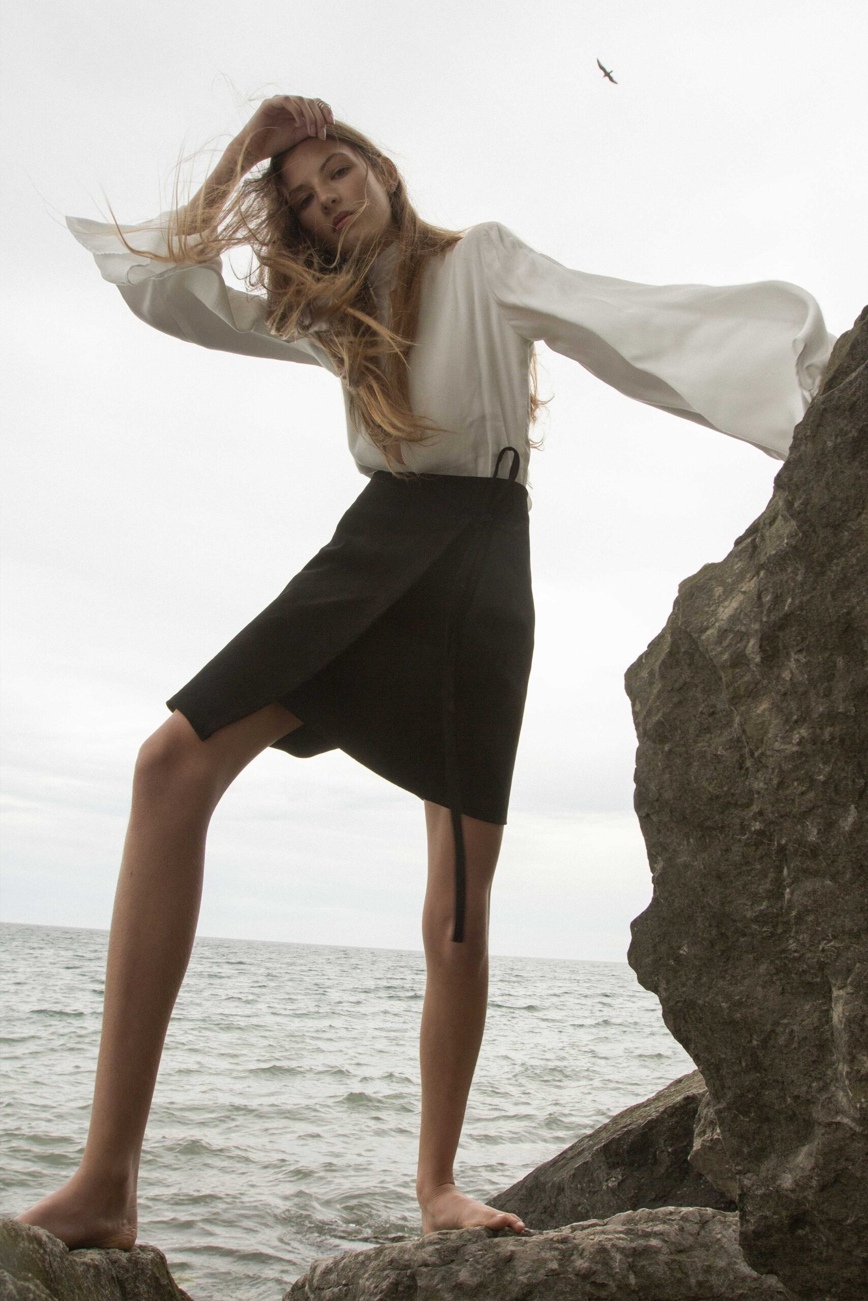 white silk high-neck blouse