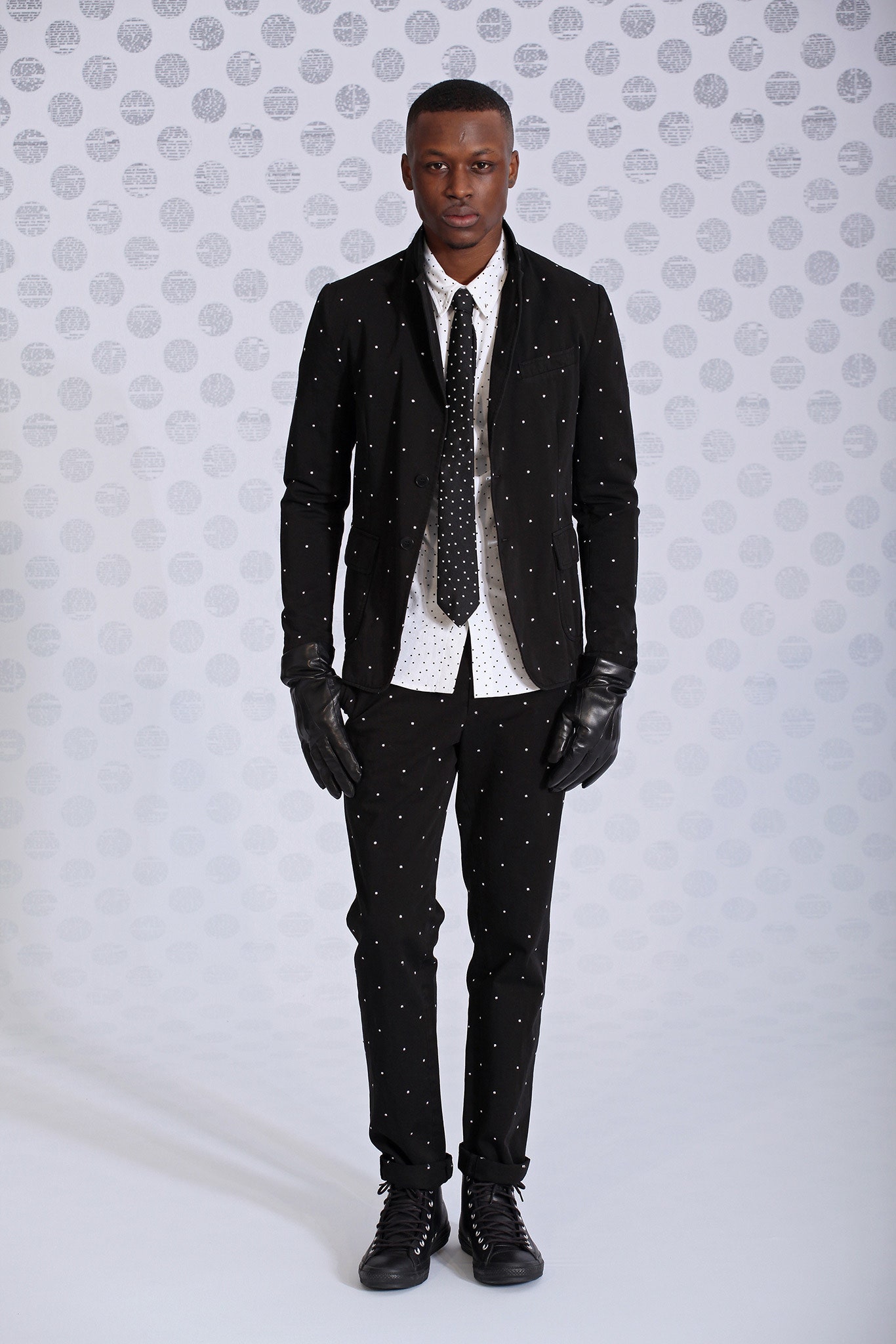 black tailored suit with white shirt